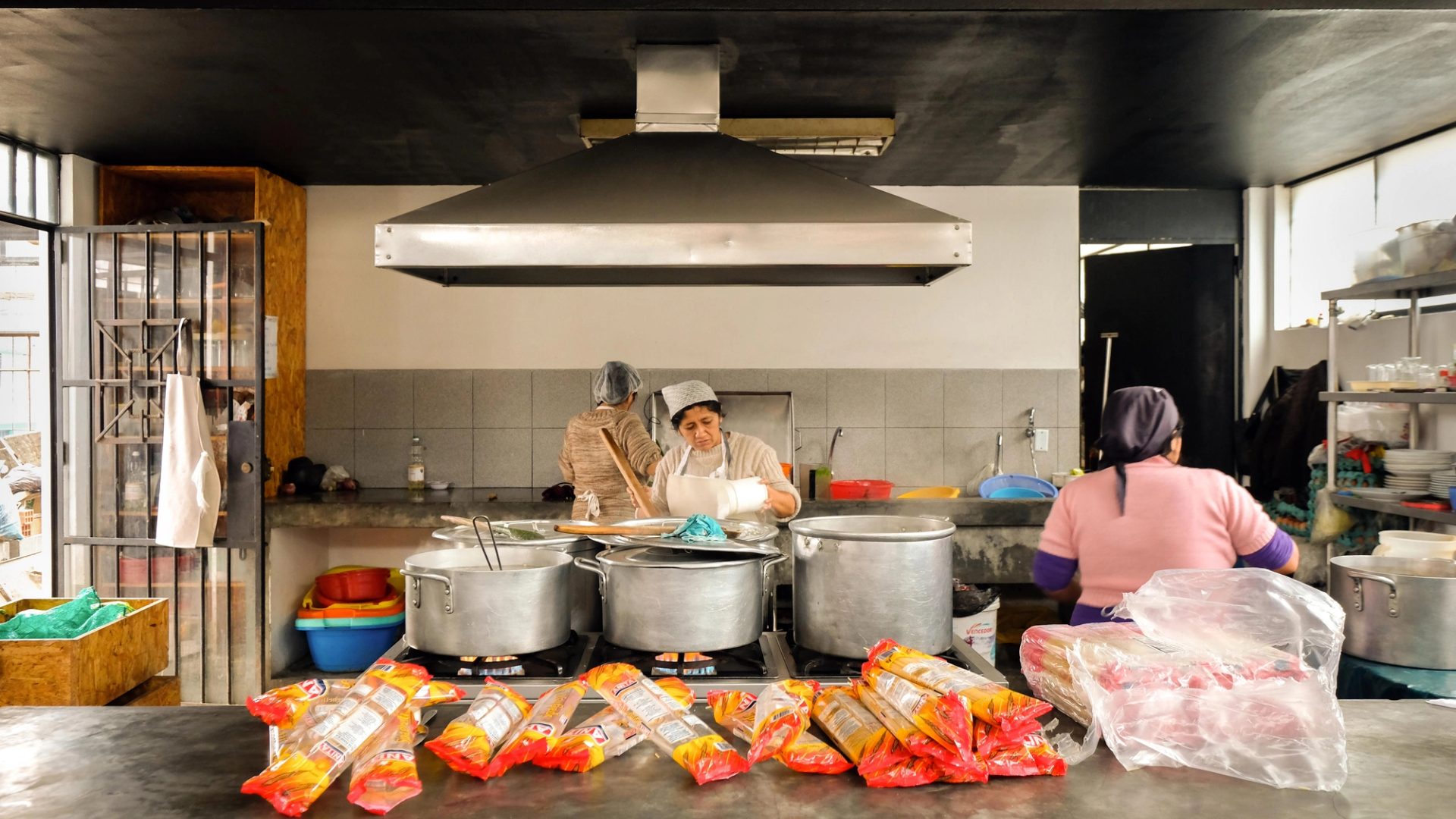 Women working in a kitchen.