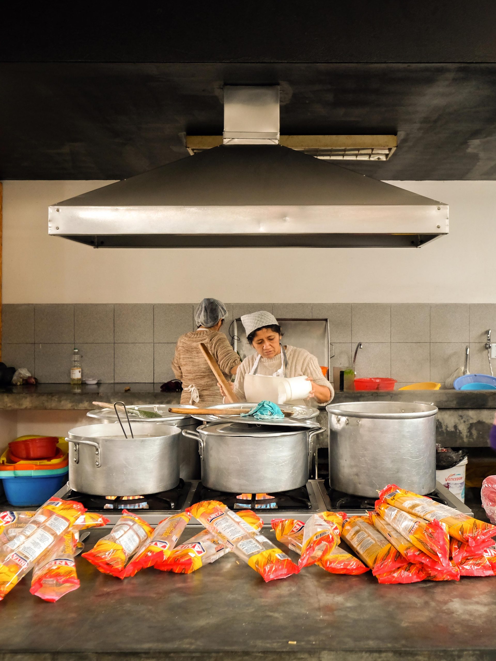 Women working in a kitchen.