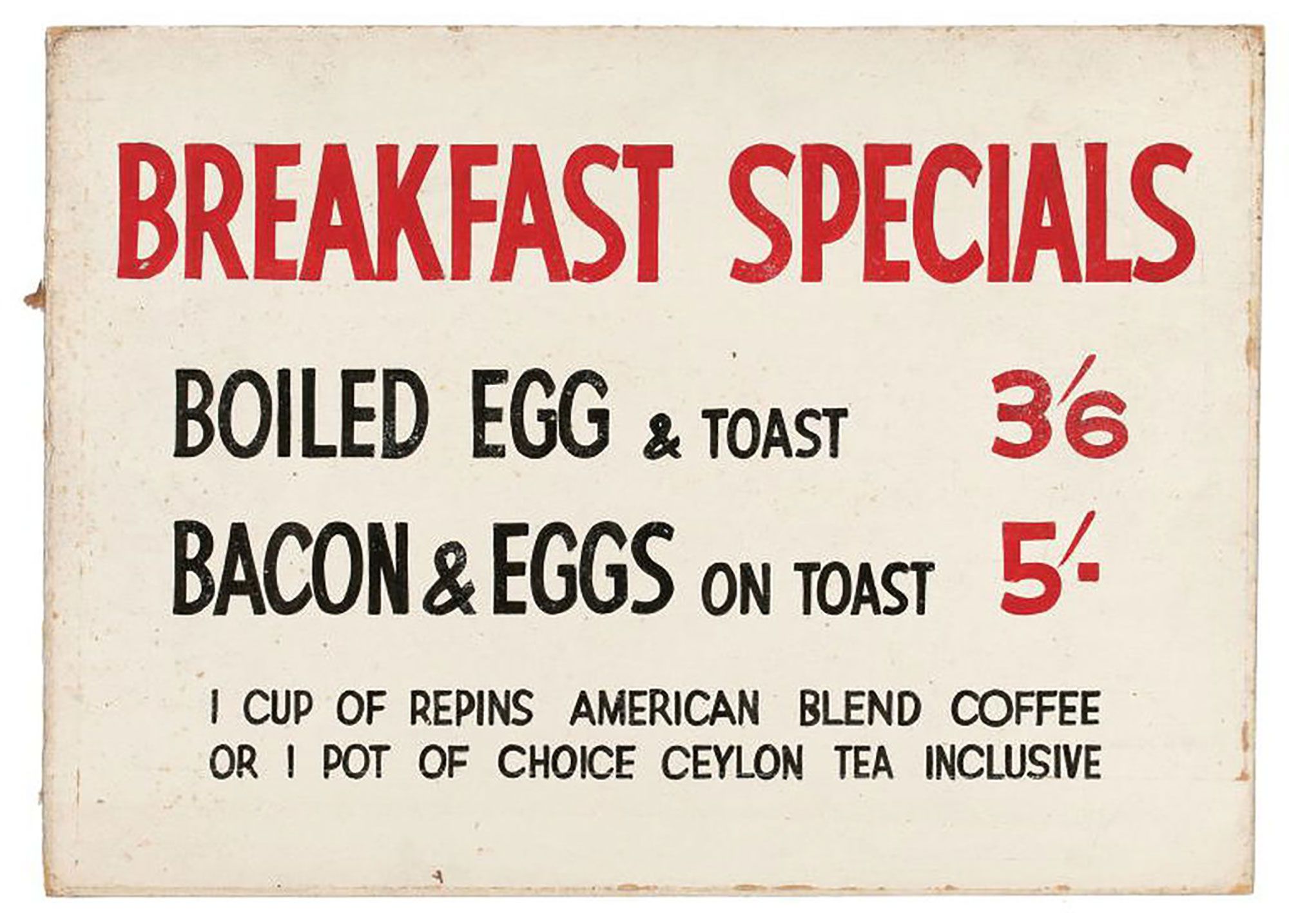 A Repin's Coffee Inn sign advertising 'BREAKFAST SPECIALS'.