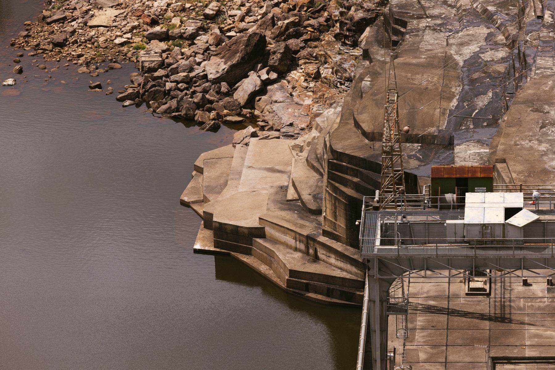High view of concrete edge to dam