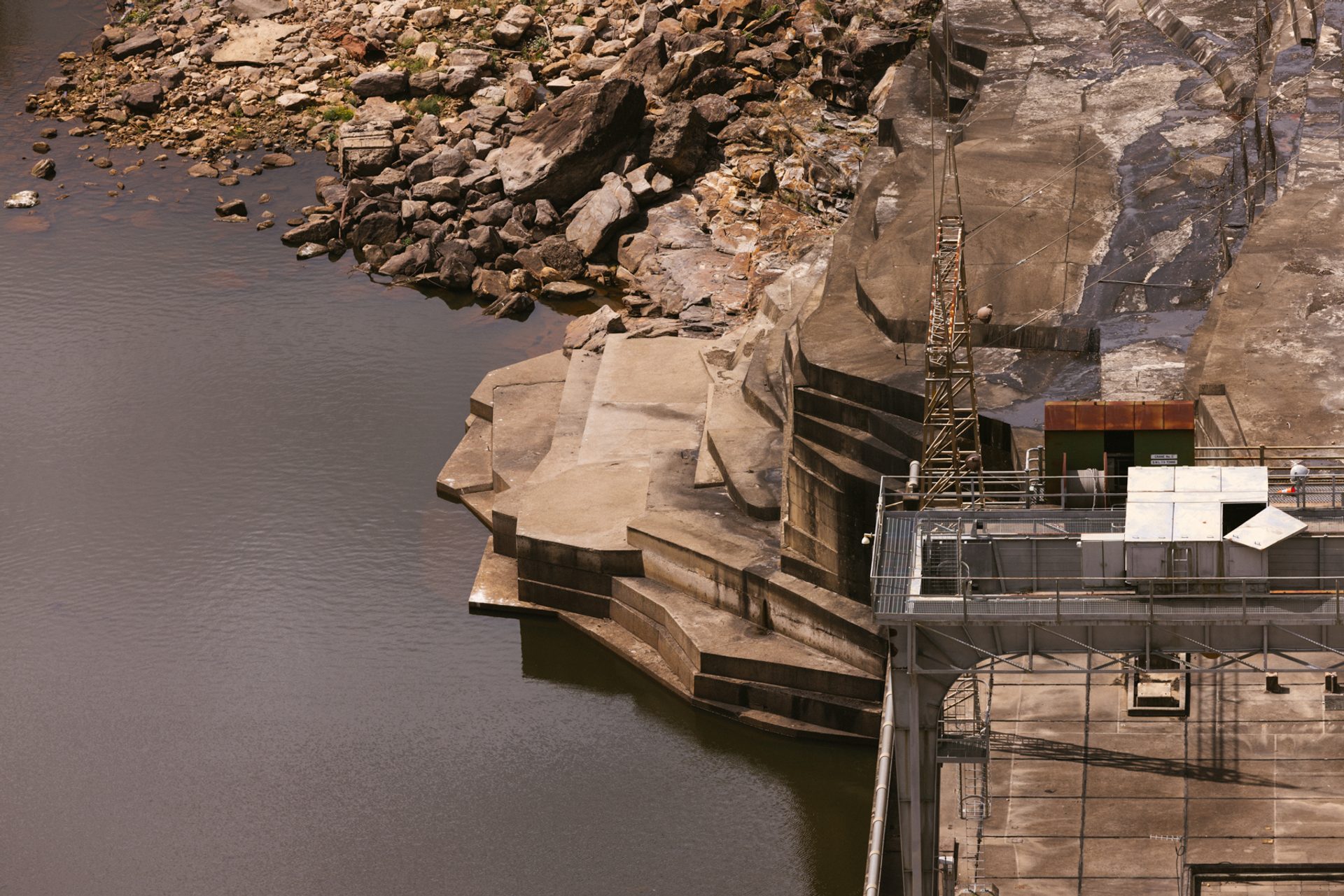 High view of concrete edge to dam