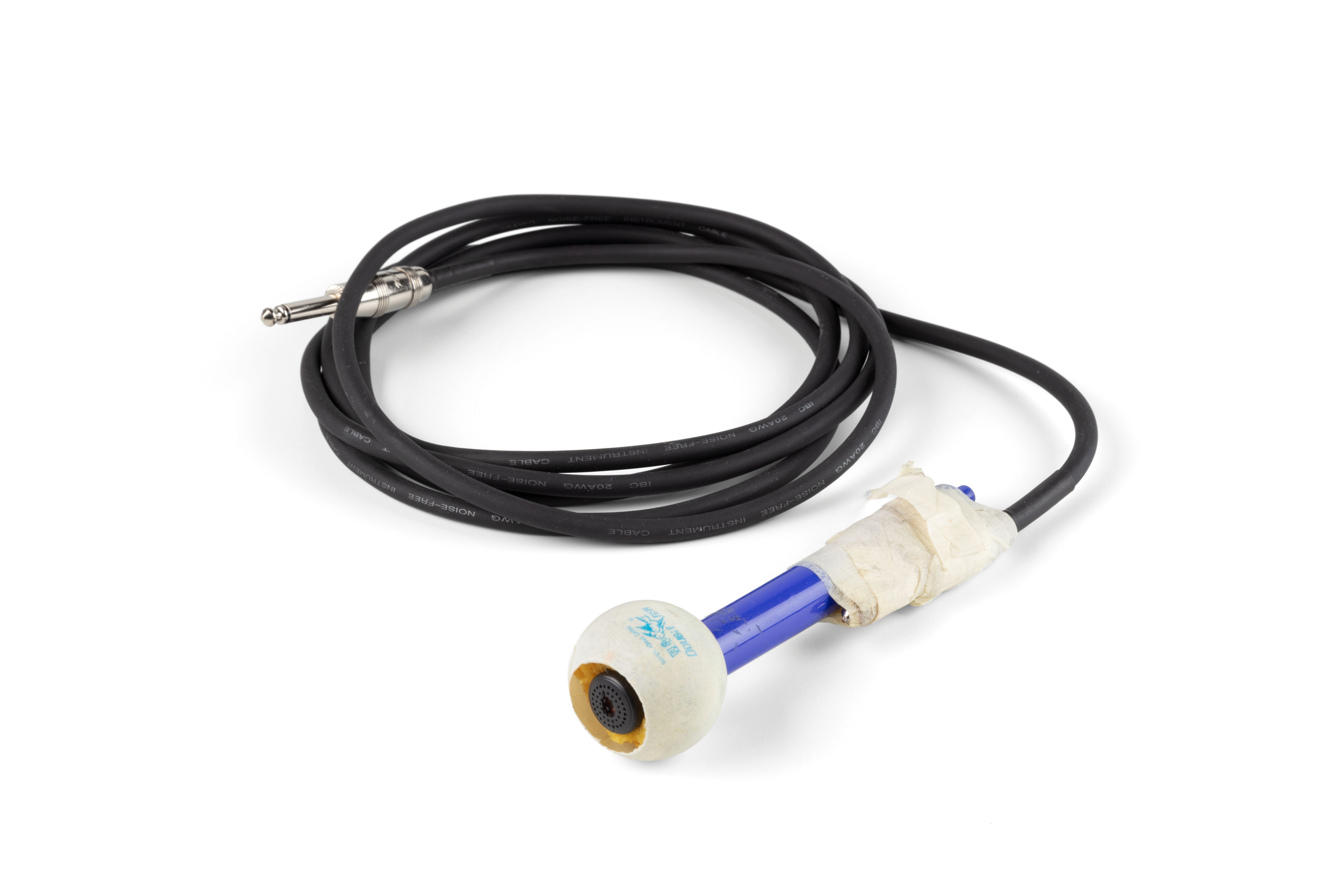 The microphone is made from a headphone ear-bud acting as the magnet, coil and diaphragm, a ping-pong ball with section of the the top removed, foam around the ear-bud, an empty felt-tip pen and a guitar lead.