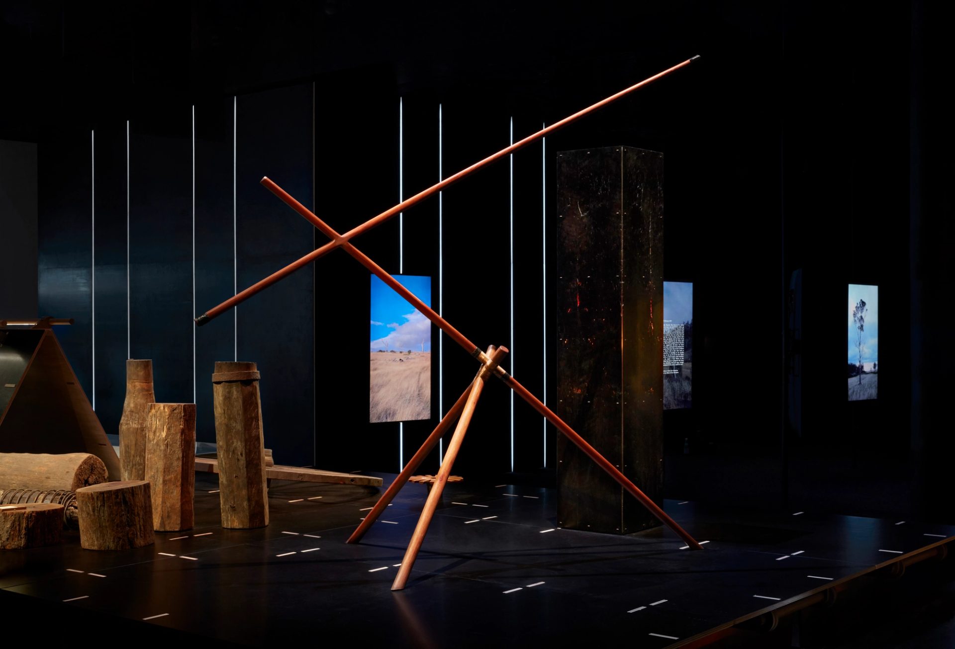 The sculpture is comprised of two parts - Wunhakali (Other Side) and Black Light House (Gurrnjann Djarratawun Wanga). Copper elements are held together with copper wire. Sculpture requires 240V power GPO.