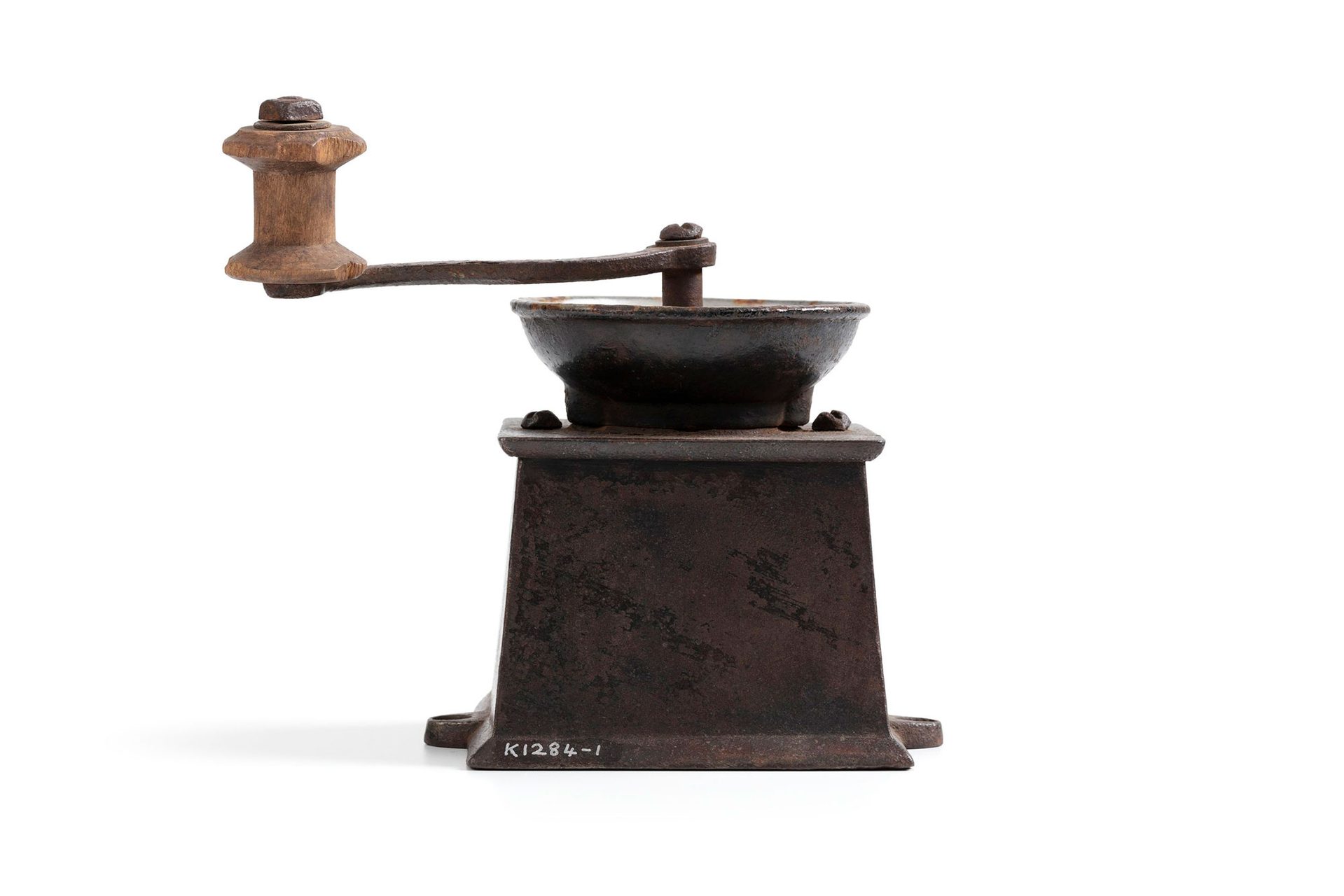 Coffee mill is of the box type, with a metal drawer at the bottom.