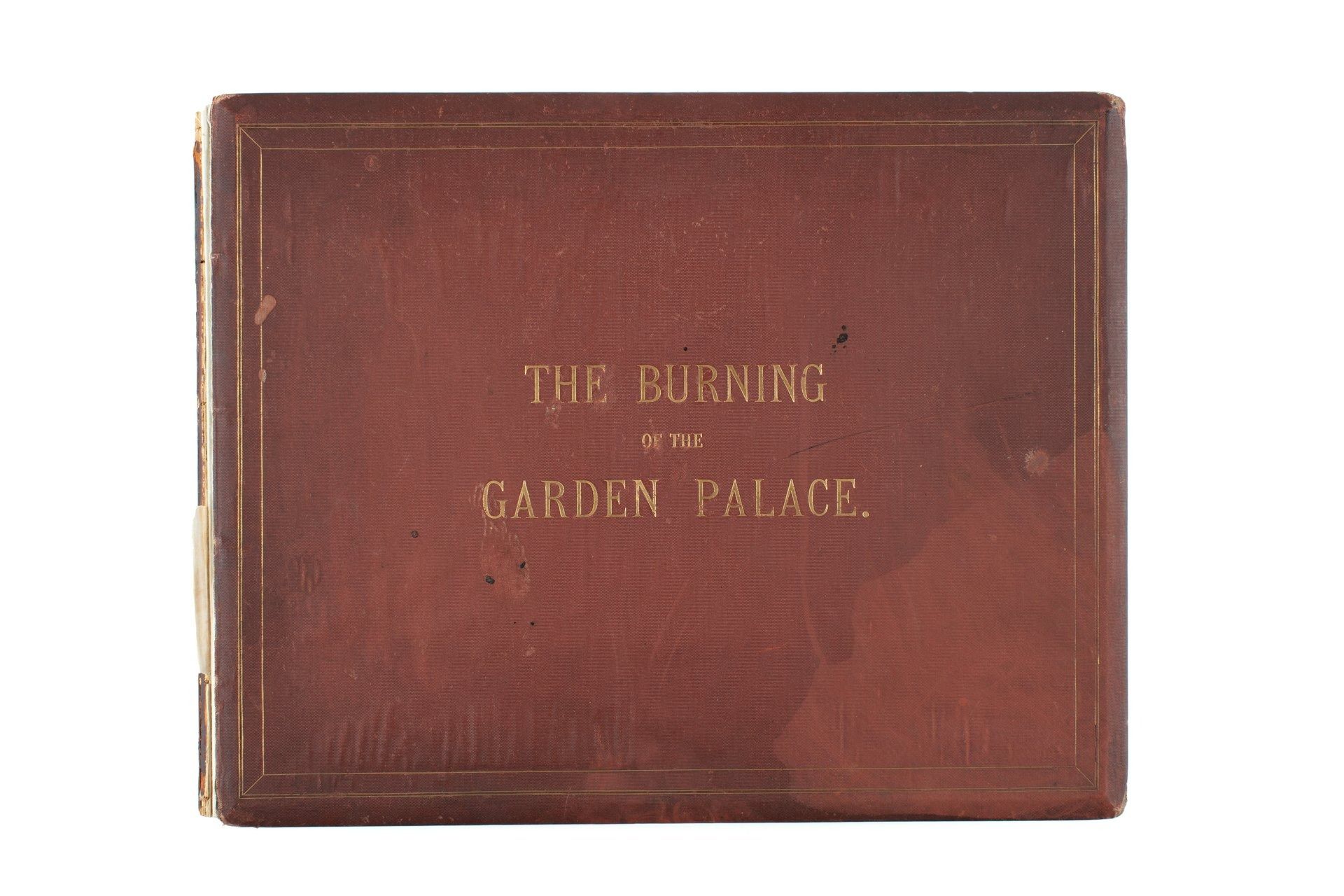 Hardcover brown leather book with gold embossed title: The Burning of the Garden Palace