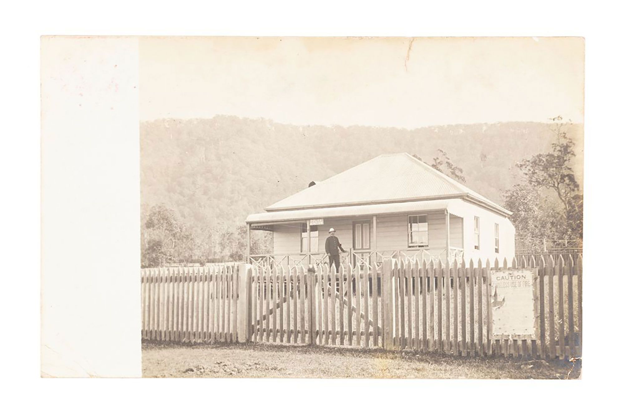 Laurieton Police Station. Sent 1906 (post mark)by Constable William Charles Kent to his mother-in-law Mrs. Hall. He says “This is our home” his wife was Mary Anna Kent (née Hall). That may be Const. Kent standing at the front of the building. He was later moved to Forster and other postcards in the collection were sent from there by the Kent family to the Hall family in Maitland, New South Wales.
