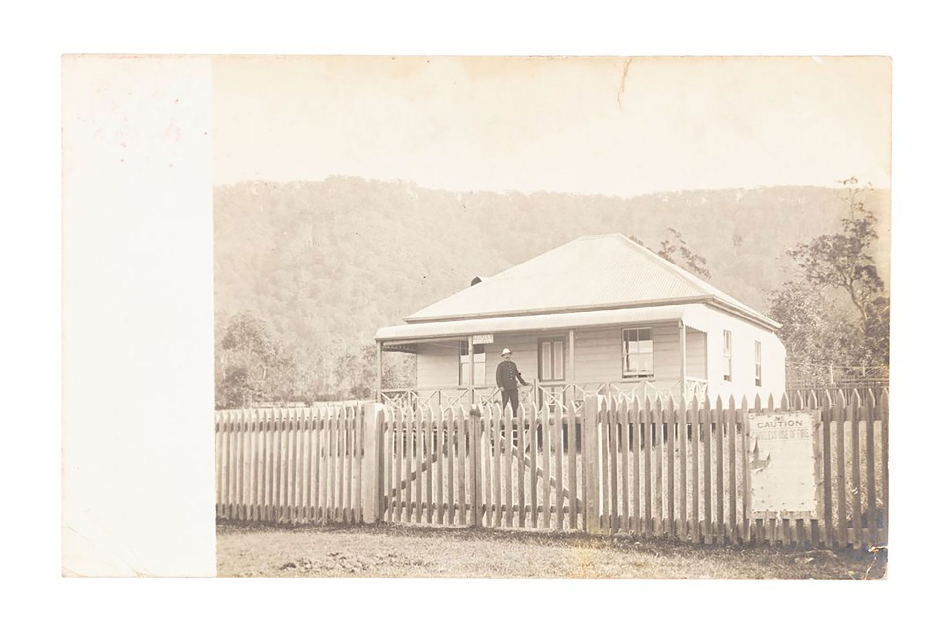 Laurieton Police Station. Sent 1906 (post mark)by Constable William Charles Kent to his mother-in-law Mrs. Hall. He says “This is our home” his wife was Mary Anna Kent (née Hall). That may be Const. Kent standing at the front of the building. He was later moved to Forster and other postcards in the collection were sent from there by the Kent family to the Hall family in Maitland, New South Wales.