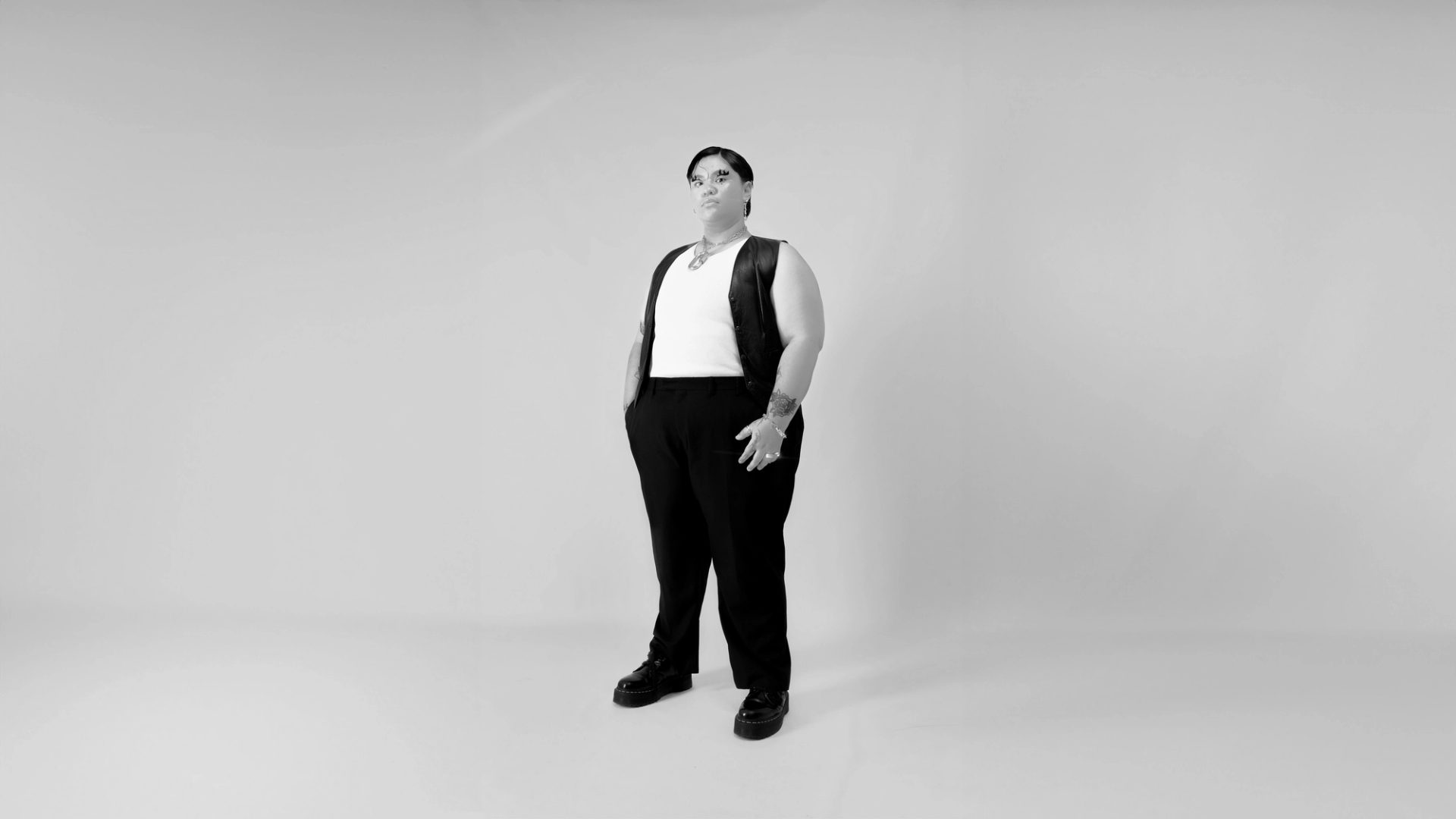 A figure standing in a photoshoot.