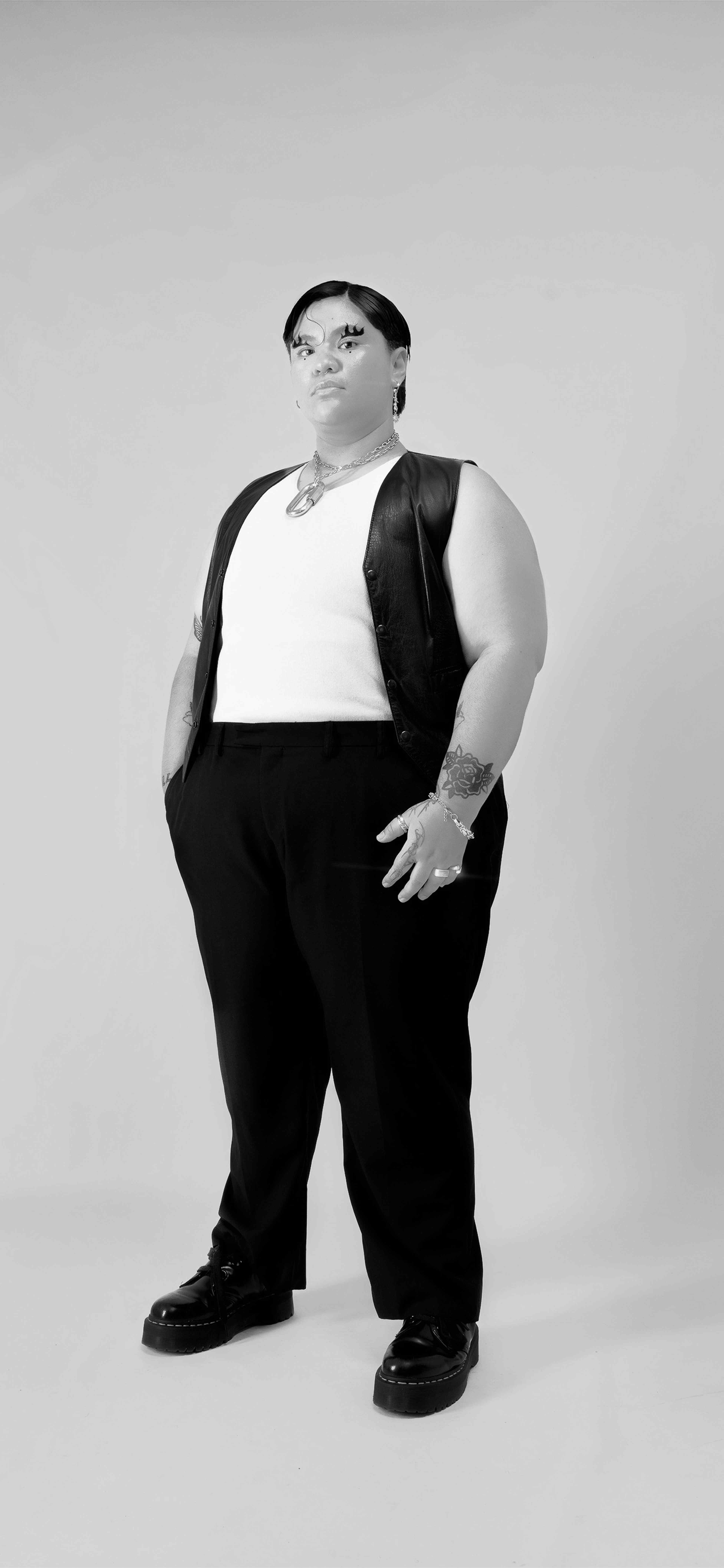 A figure standing in a photoshoot.