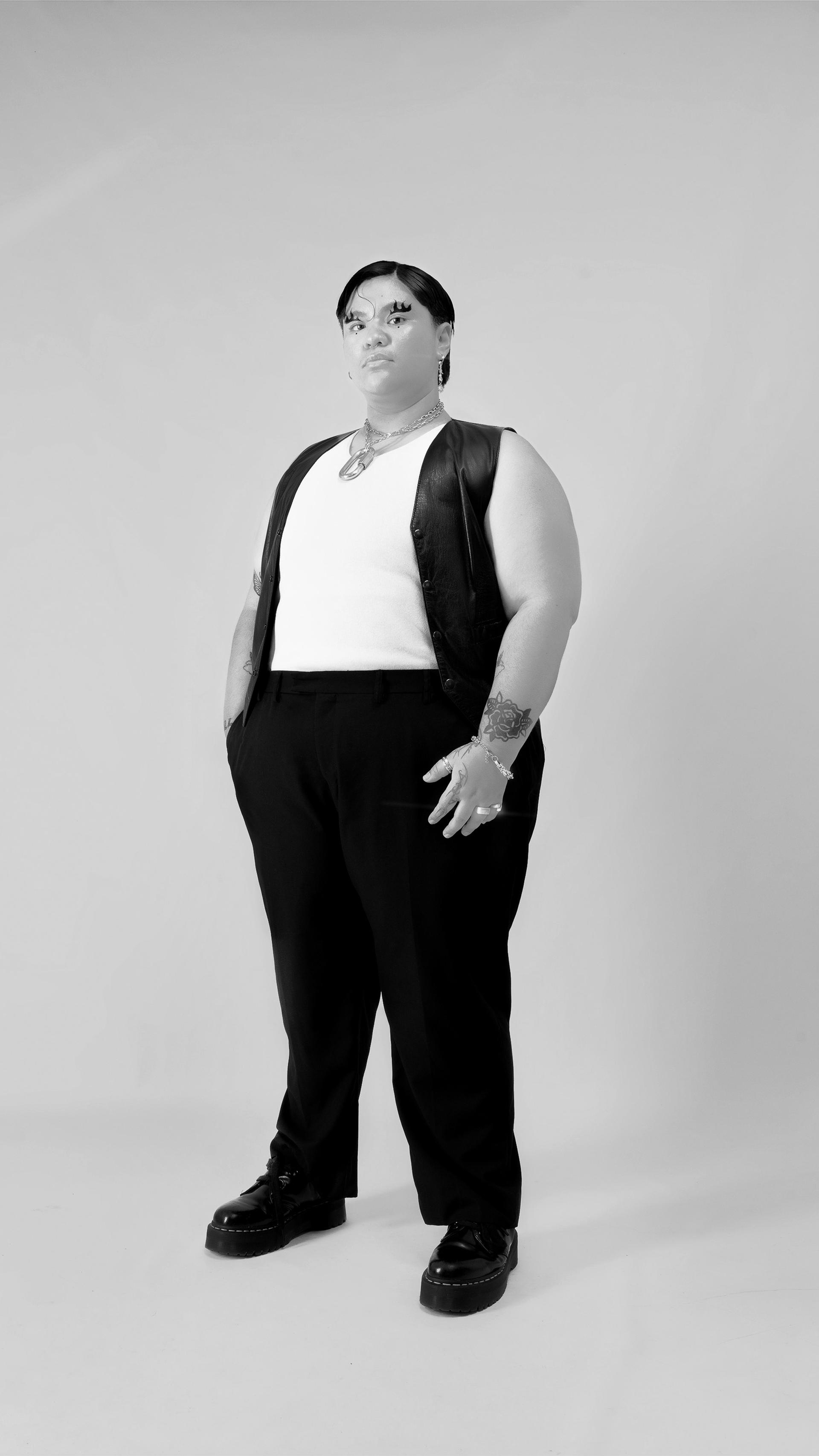 A figure standing in a photoshoot.
