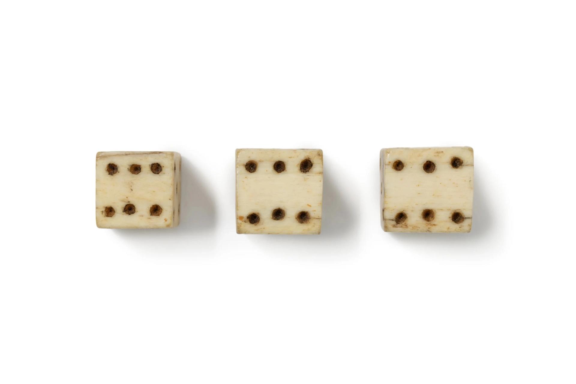 Sperm whale tooth dice.