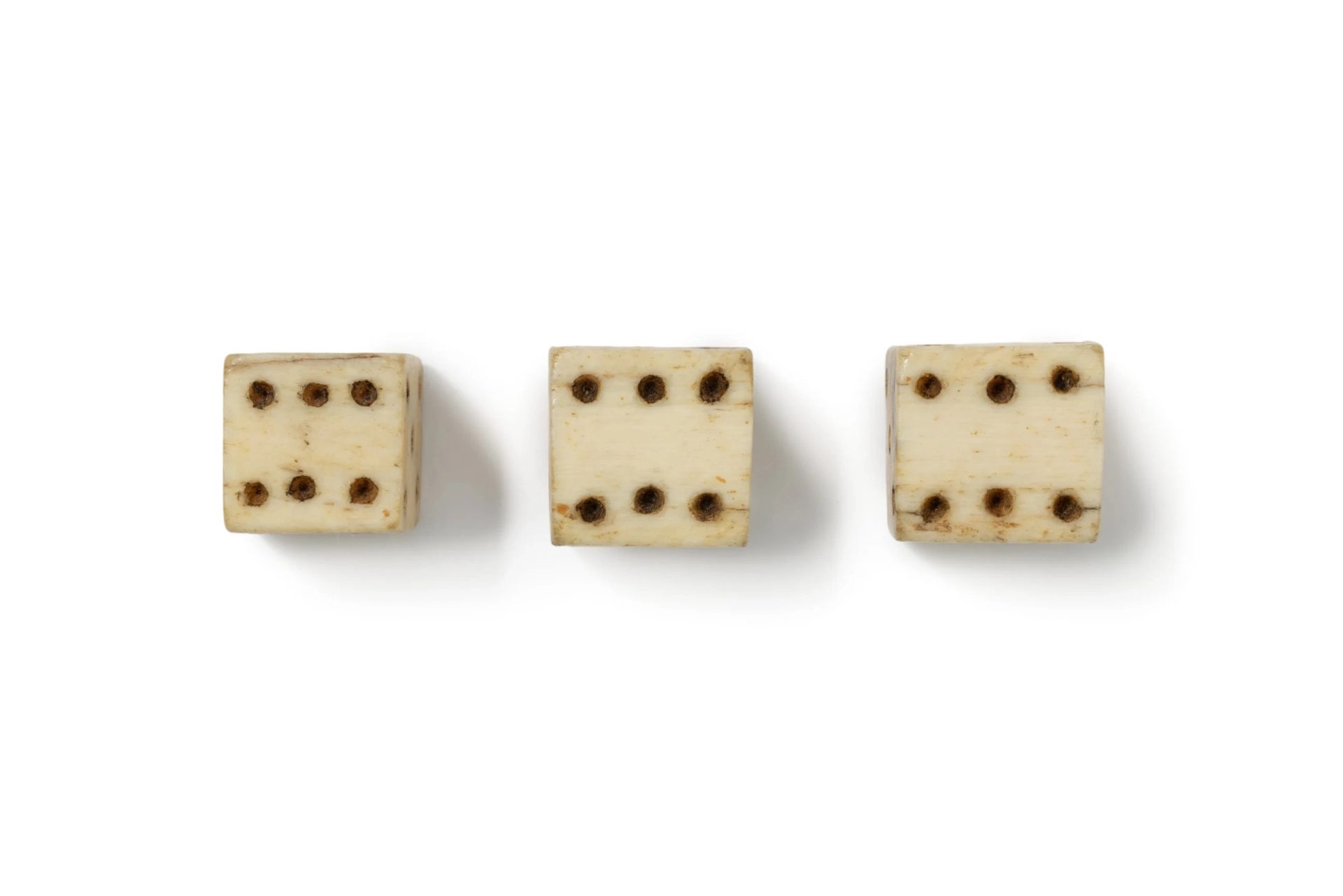 Sperm whale tooth dice.