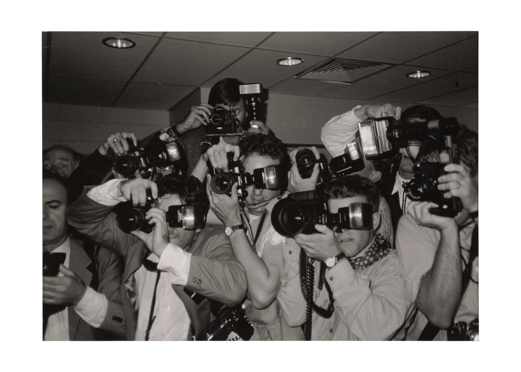 Black and white photograph of paparazzi