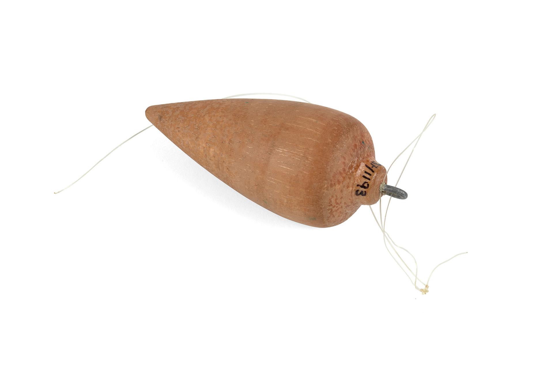 Wooden pendulum used for radiesthesia.