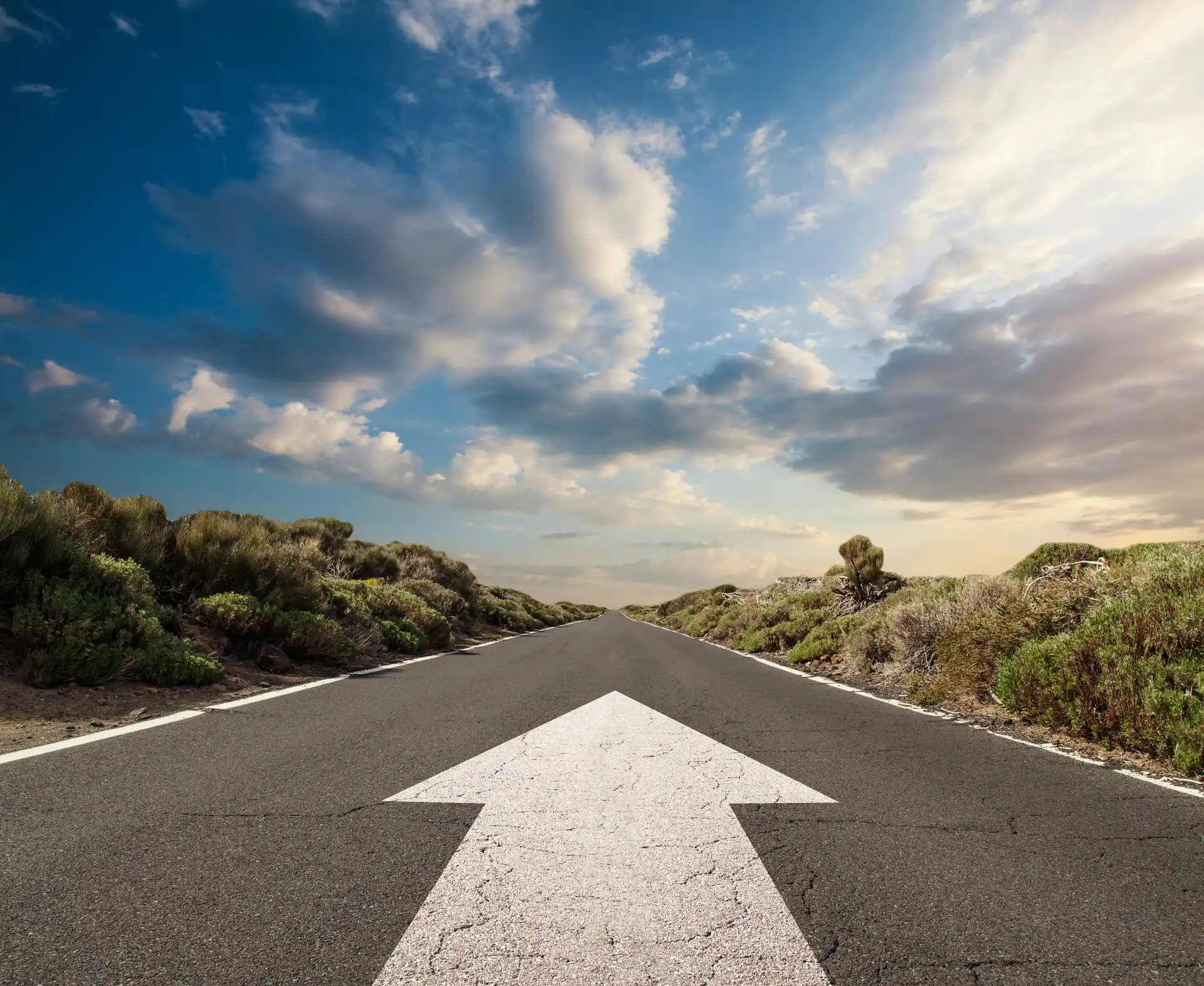 Image of a large arrow on a road denoting AI lead generation.