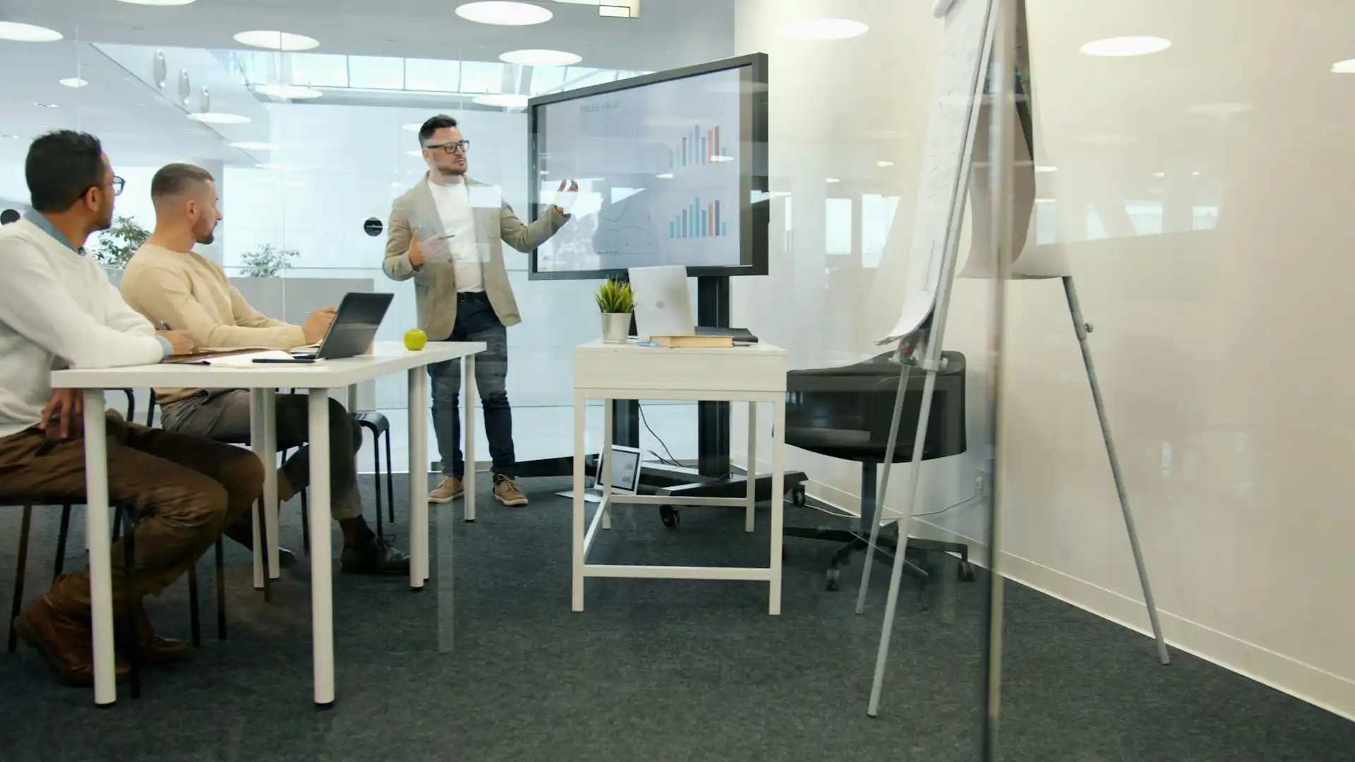 Business professionals in a boardroom meeting discussing strategy, representing enterprise AI adoption decisions