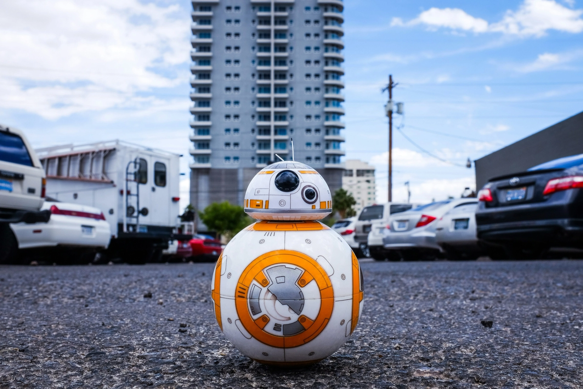 Photorealistic render of a rotund, Star Wars–style service droid standing in a modern business environment, symbolizing AI-powered automation and competitive advantage in customer service, operations, and innovation.
