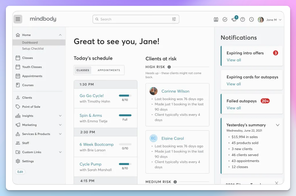 Mindbody business dashboard showing today's class schedule, at-risk clients, and notifications for a fitness studio