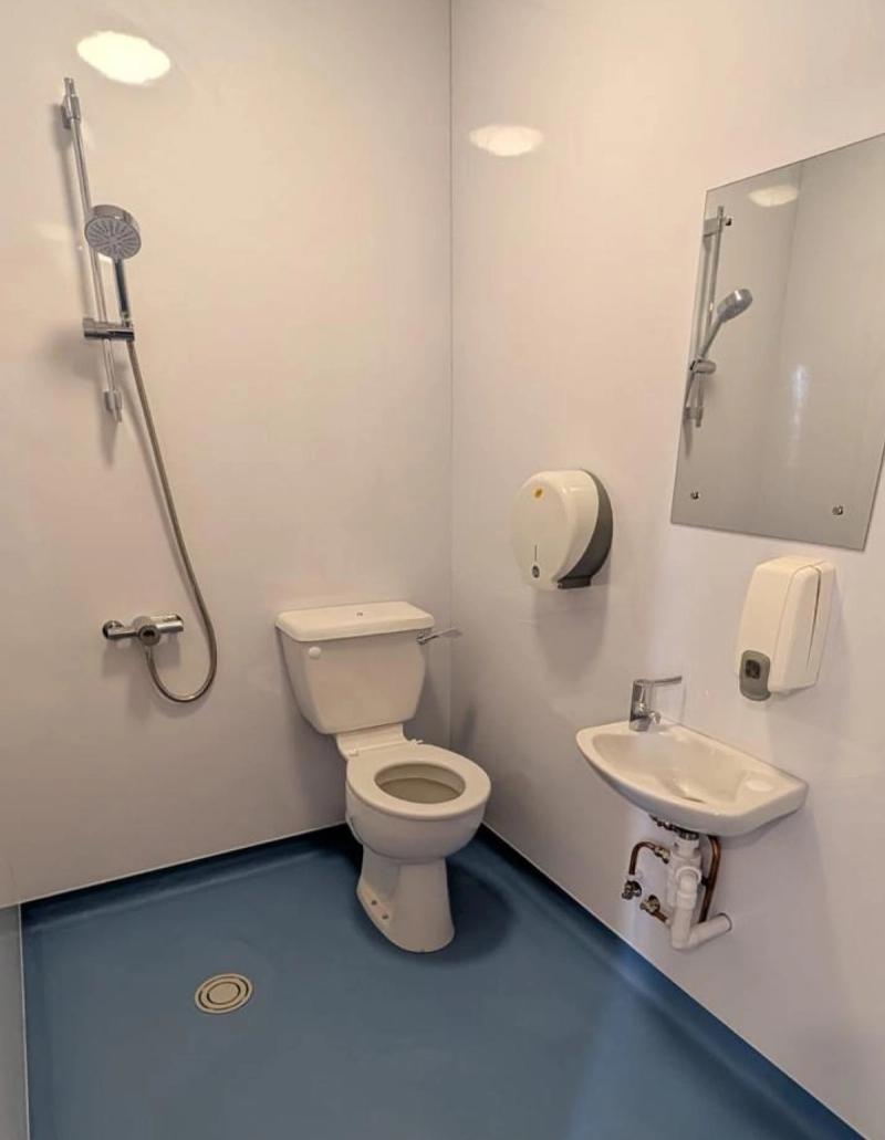 Accessible wet room with toilet and shower