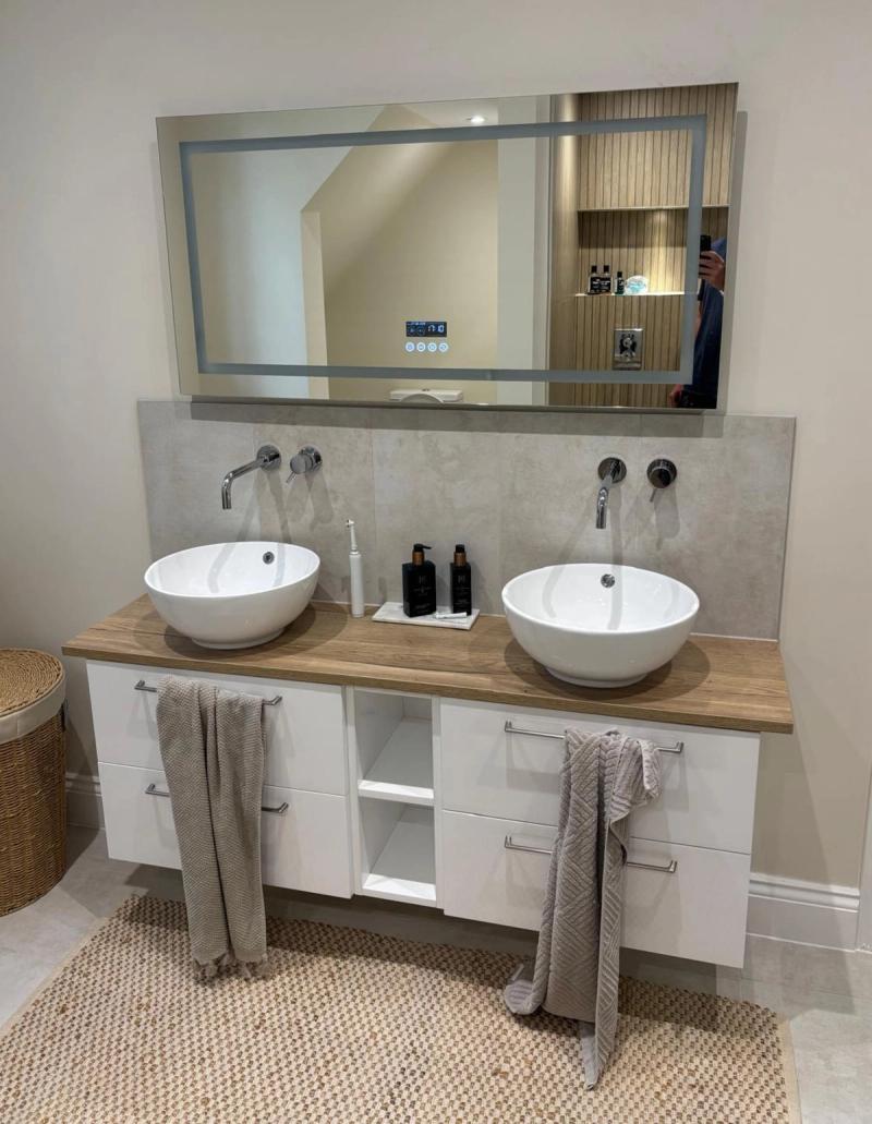 Double vessel sinks on wood vanity