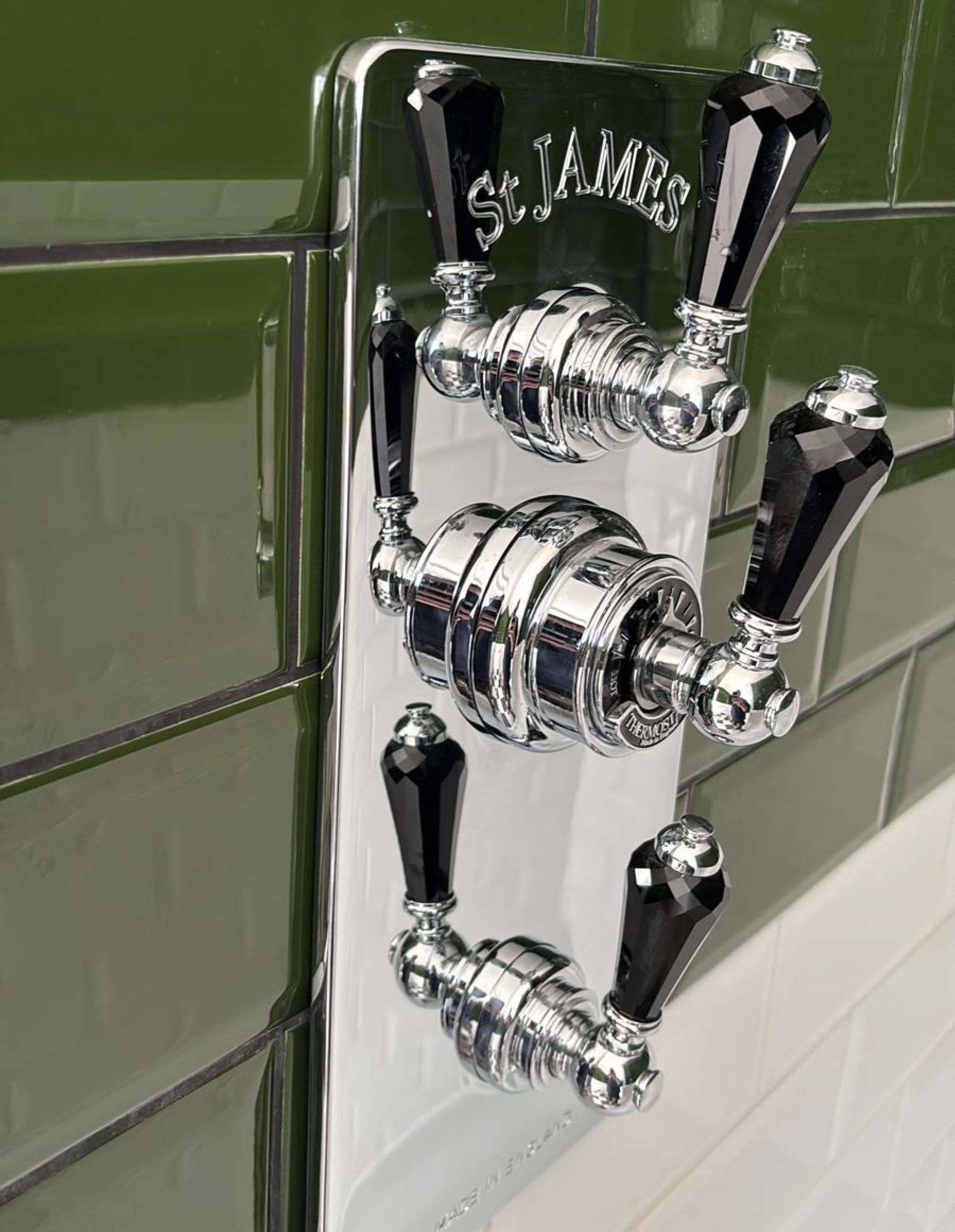 Chrome shower controls with black handles