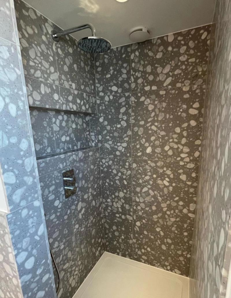 Terrazzo walk-in shower with rain head