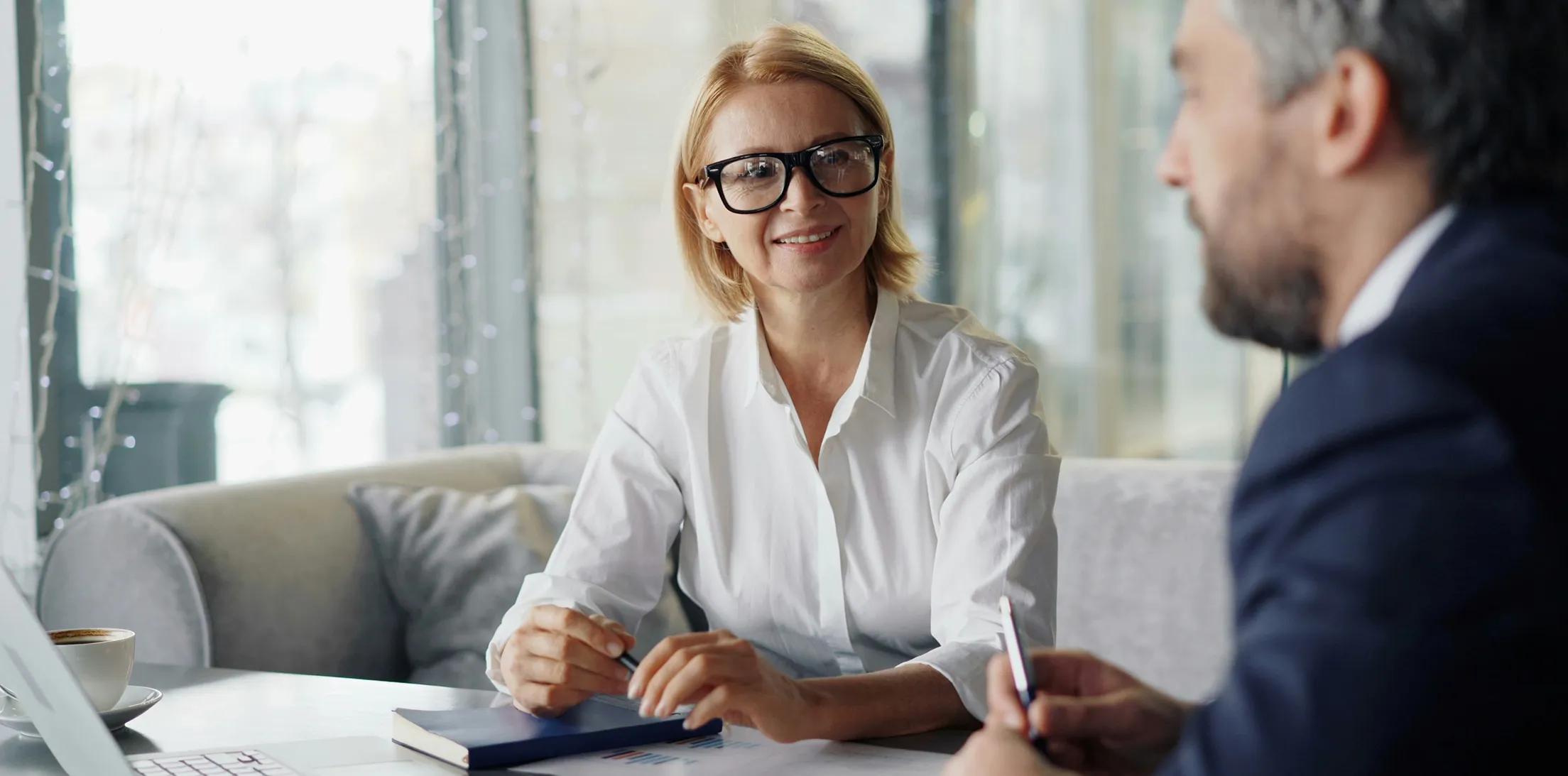A financial advisor meeting with a client.