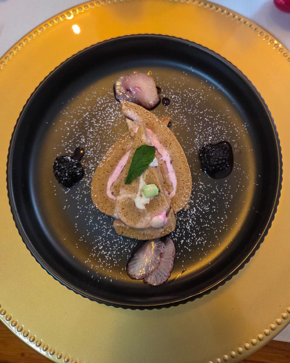 Luxury Bulla Grapenut swirl ice cream cake with fresh berries, mint garnish, and artisanal plating from an exclusive Caribbean fusion tasting menu by JWU-trained Chef Kimberly Kee