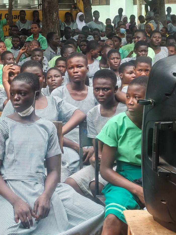 A crowded classroom of pupils during a foundation visit