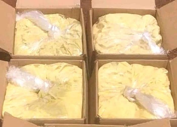 Boxes of processed shea butter ready for use