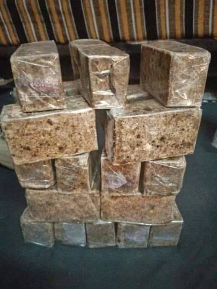 Blocks of cured black soap stacked after processing