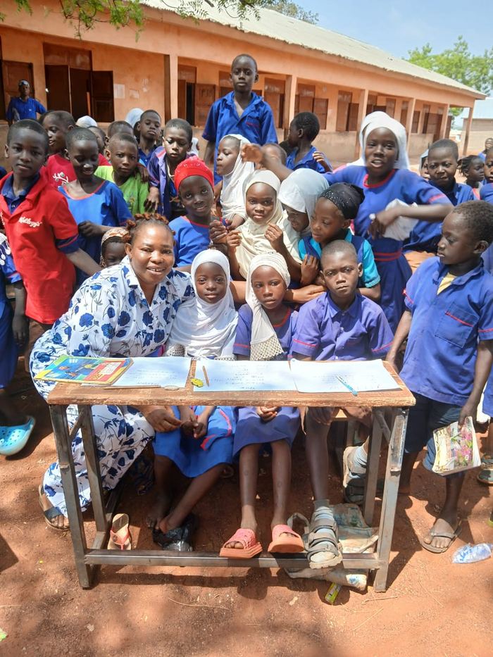 Pupils seated at desks in a classroom during a school visit