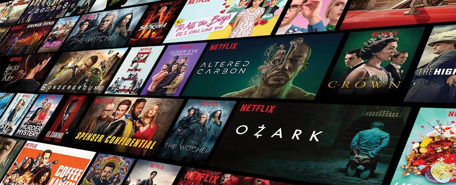 A Netflix streaming platform interface displaying rows of colorful movie and television show tiles, including titles like Altered Carbon, The Crown, and Ozark.