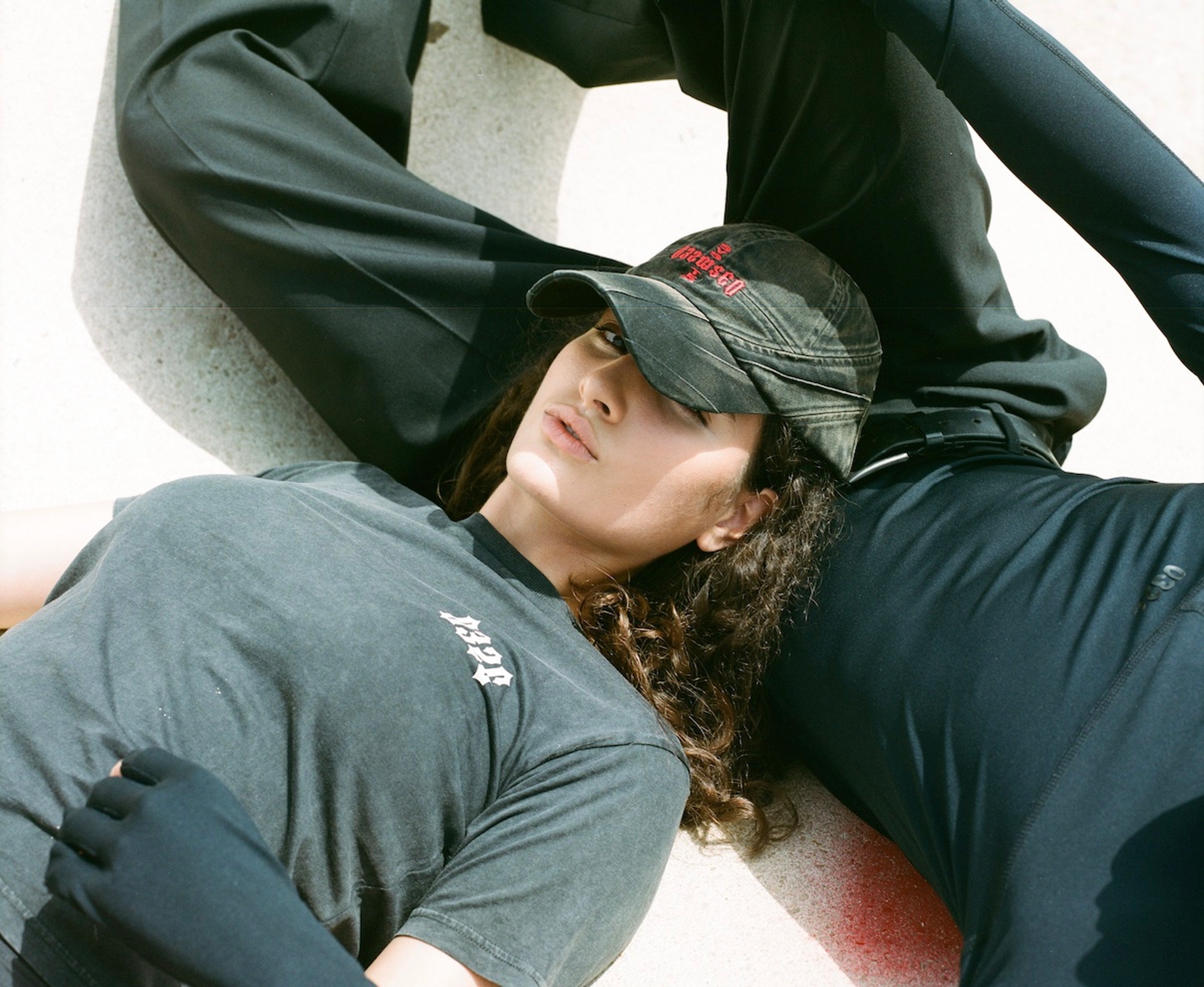MALE MODEL WEARS: 

AUTHENTIC ''TEAM'' TAG RASHGUARD GLOVE SLEEVE, WOOL WIDE LEG SUIT TROUSERS

FEMALE WEARS: CRUX RACER CAP, FITTED ''KEPLER'' SYSTEM T-SHIRT 