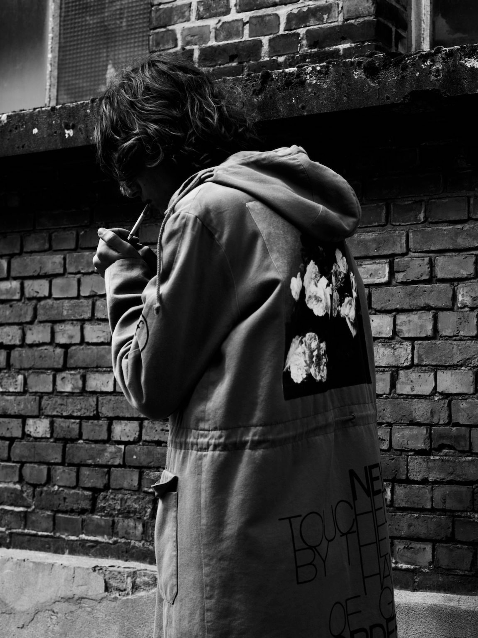 JOLAN: cotton parka with 'New Order' hand painted appliqué and slogan: RAF SIMONS A/W 2003/2004
