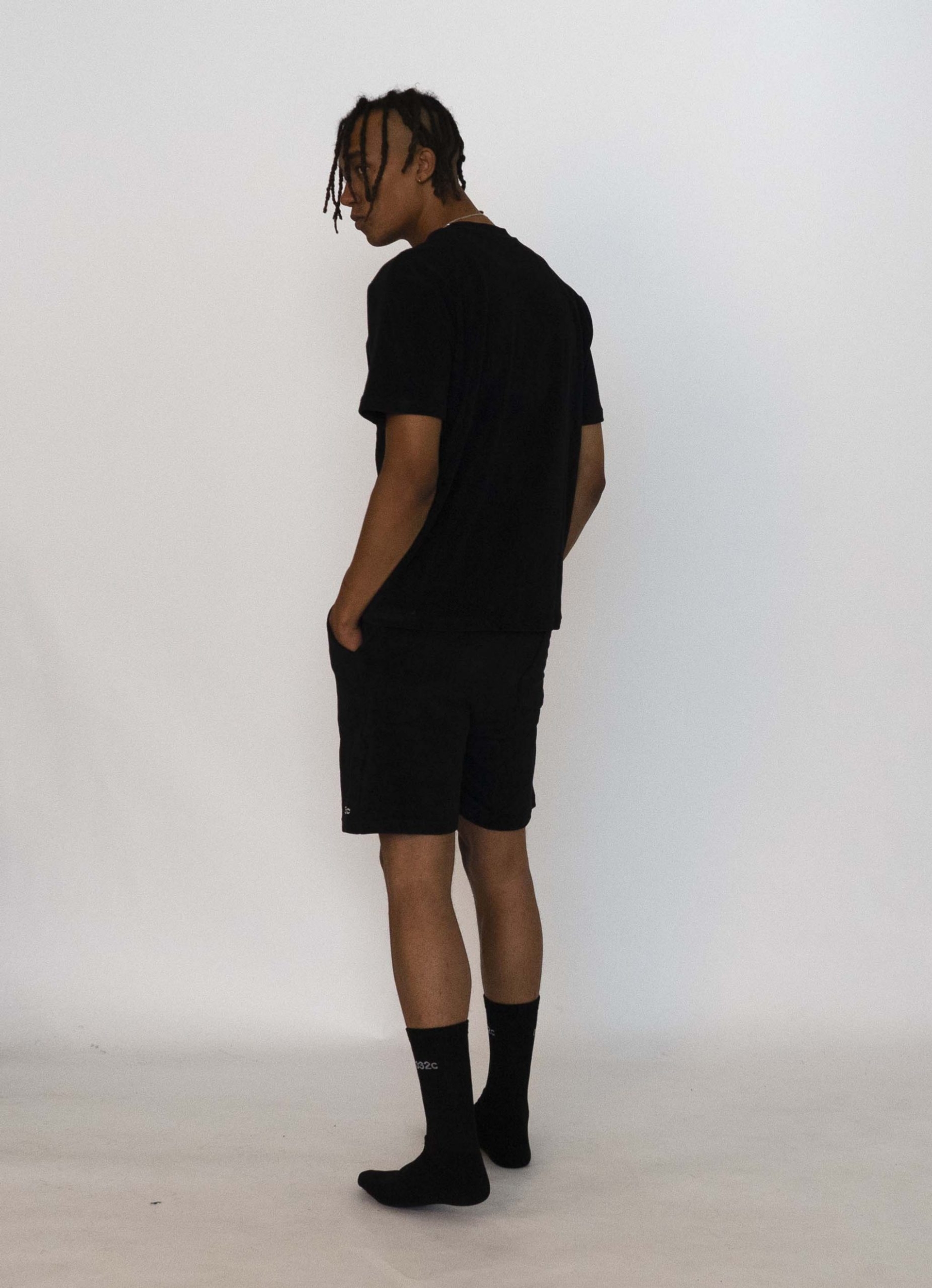 Buyegi goes for the full ensemble in the 032c LoveSexDreams Terry t-shirt in black, and the Terry shorts in black, to match