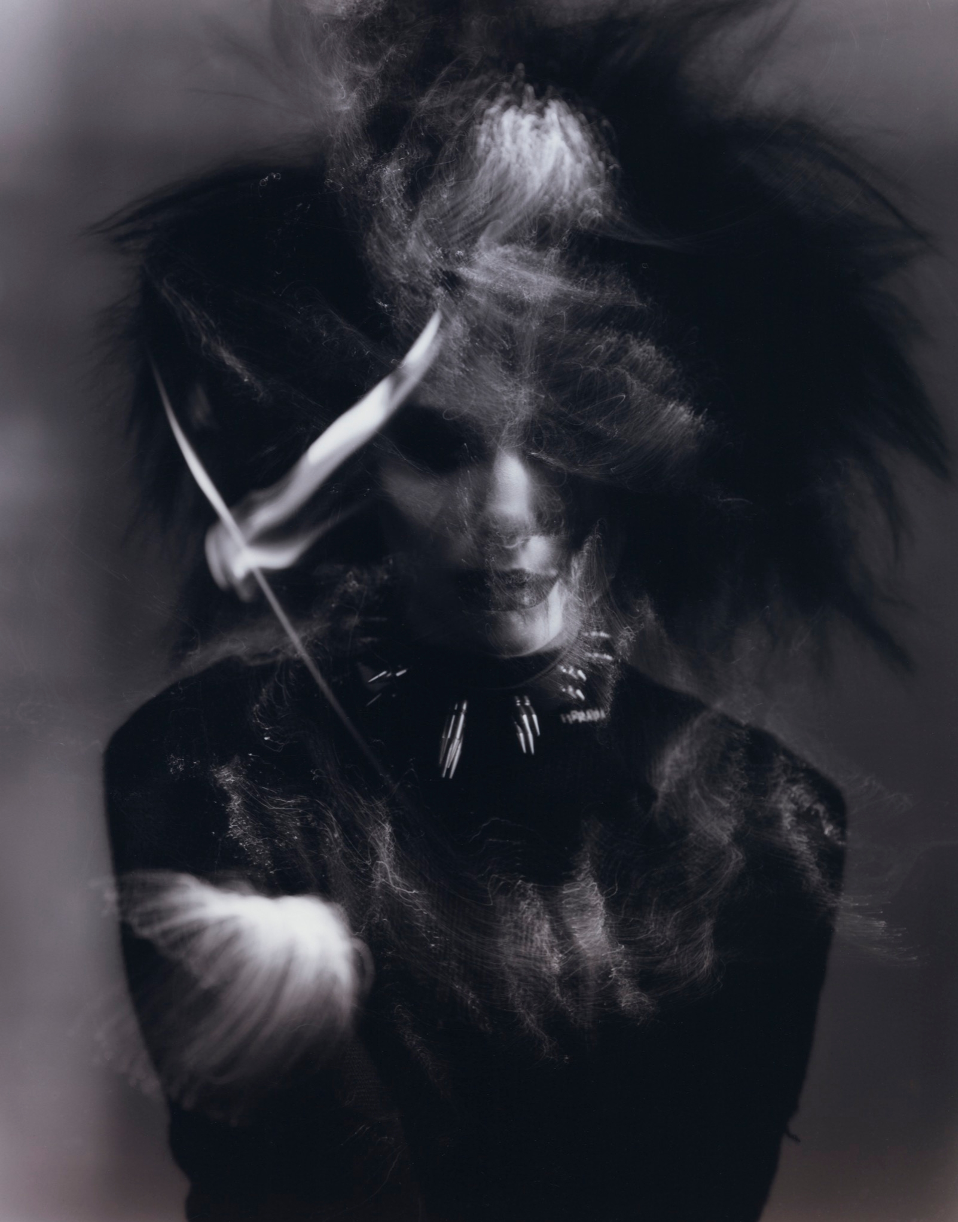 knitwear PRADA cuffs THE LONDON LEATHERMAN fishnet top, choker, and belt chain STYLIST'S OWN