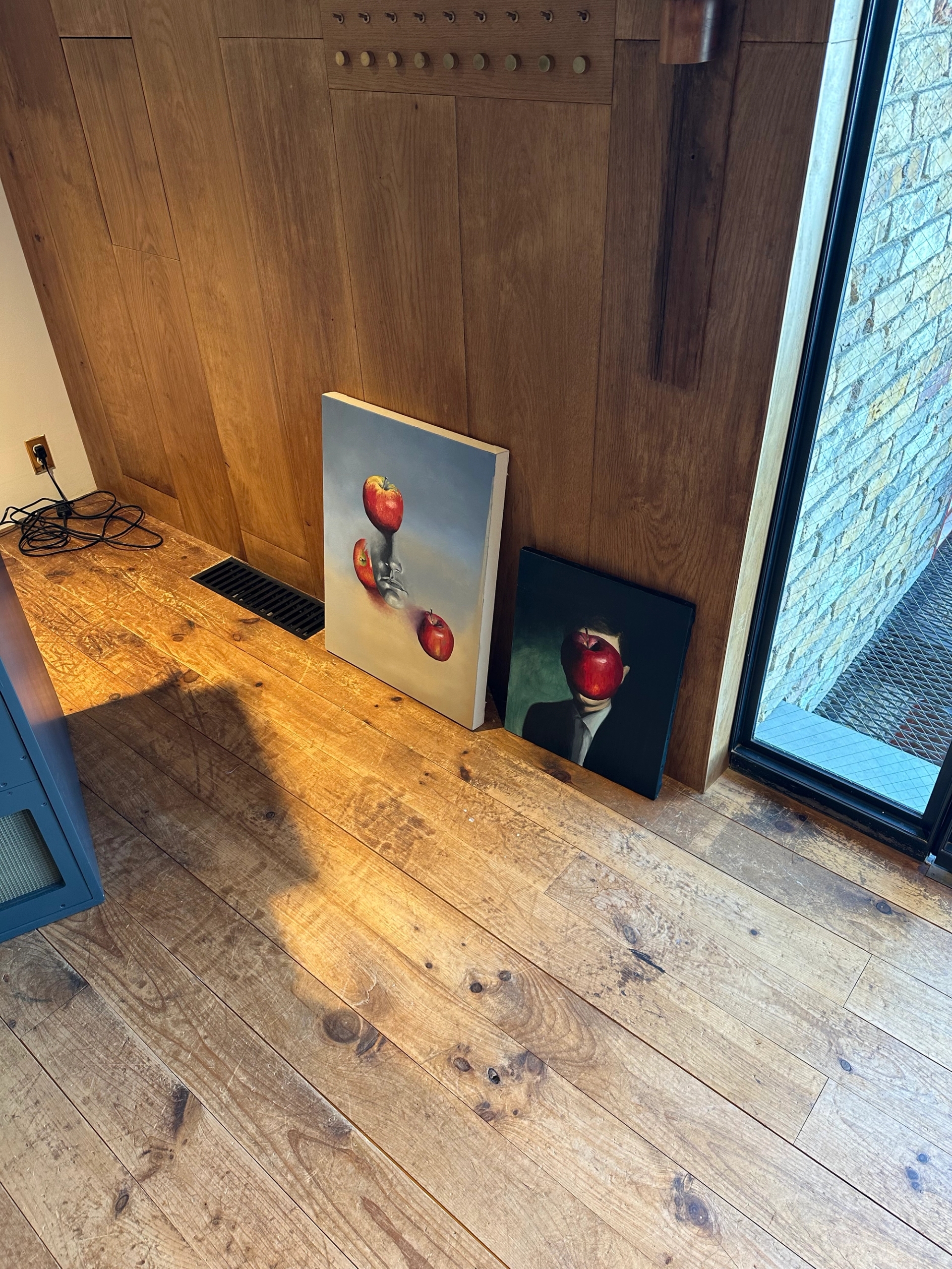 Two of Takahashi’s paintings, including Apple over Bill Evans, 2024 (right)