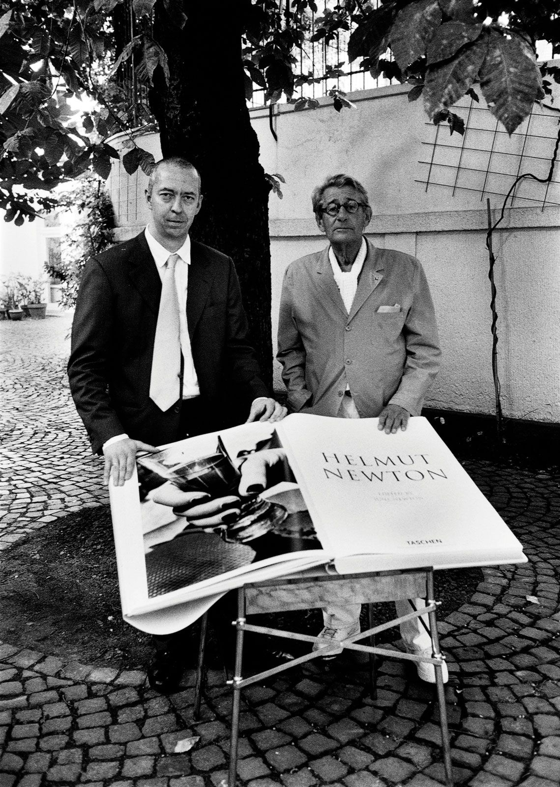 Taschen with Helmut Newton and the photographer's Sumo book on its table, designed by Philippe Starck, in 1999. Photo: Alice Springs