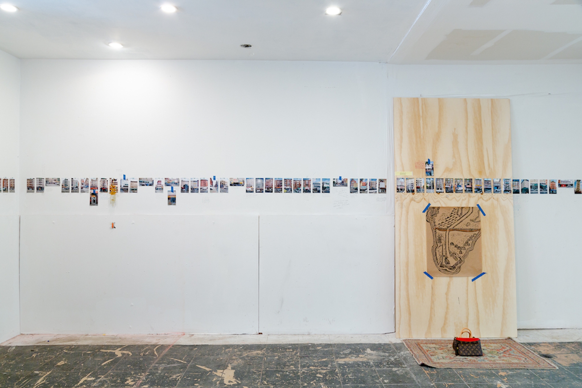 Installation views of Canal Street Research Association including a timeline/landscape wrapping around the room inviting visitors to inscribe themselves into it alongside highlights from the archive of poetry-garments. Photo by Daniel Terna. Courtesy Shanzhai Lyric.
