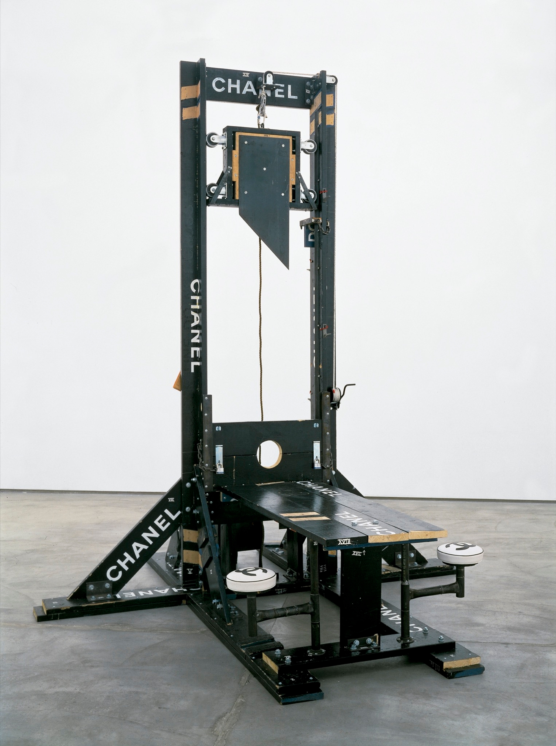 Chanel Guillotine (Breakfast Nook), 1998. “I’ve always admired and appreciated Chanel but I couldn’t really rock it,” Sachs said in a 2016 interview. “I started to try and use that brand in my art and bring it into my life as a way of participating; I put Chanel logos on things when I wanted to make them more powerful and give them more authority.” Photo courtesy of Galerie Thaddaeus Ropac.