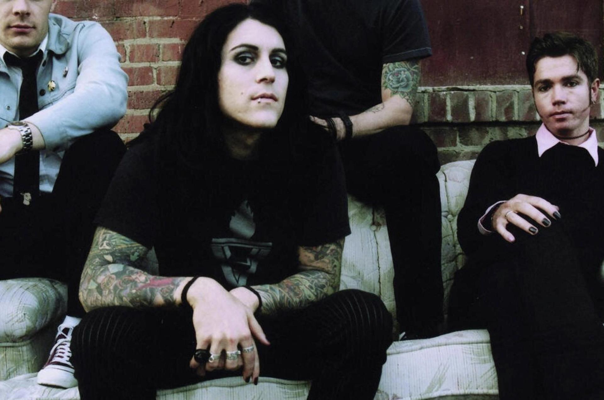 An AFI promotional photograph from the early 2000s. Davey Havok is pictured sitting center. Courtesy Nitro Records.