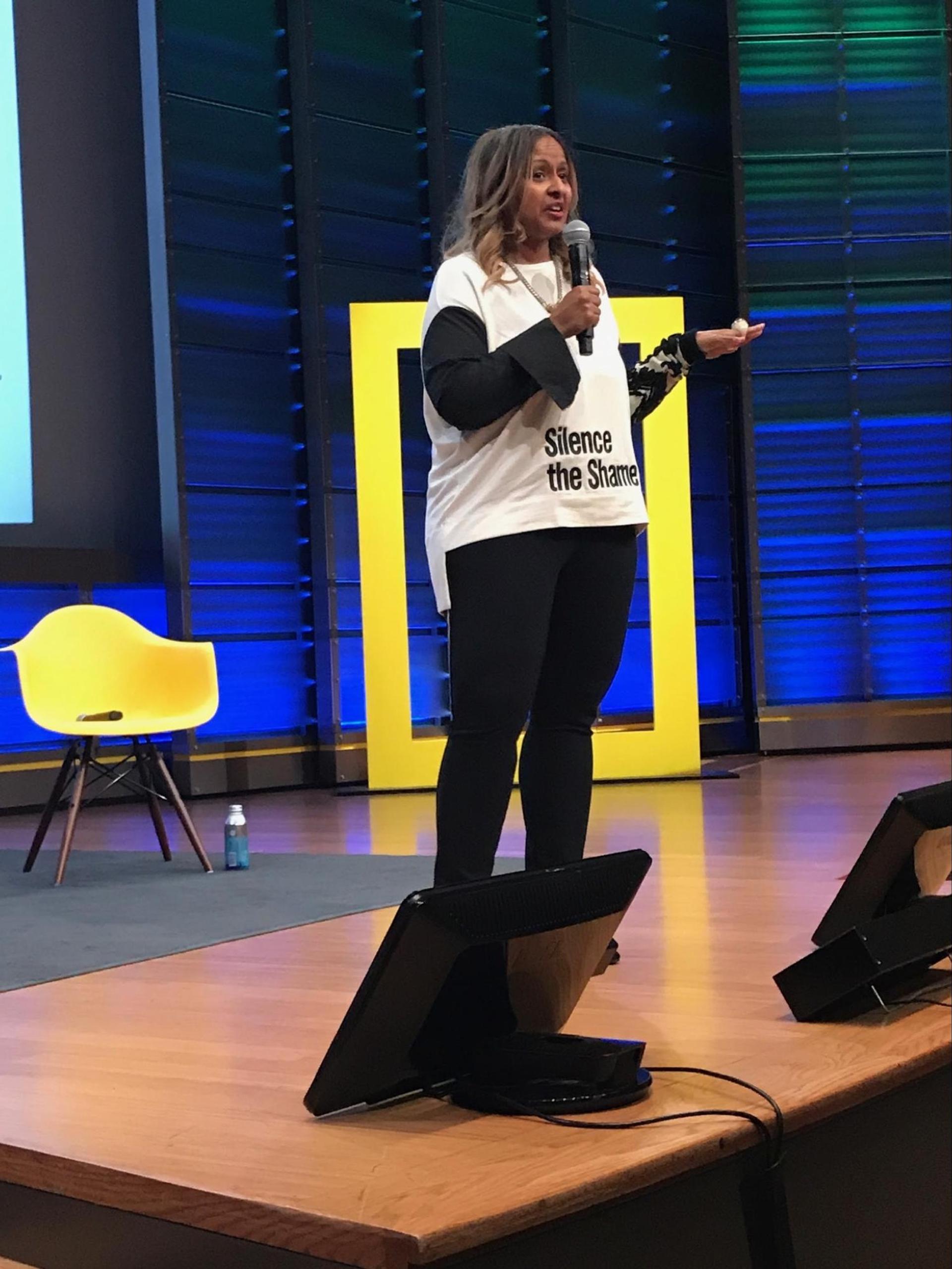 Shanti Das speaking at the National Geographic headquarters in 2019