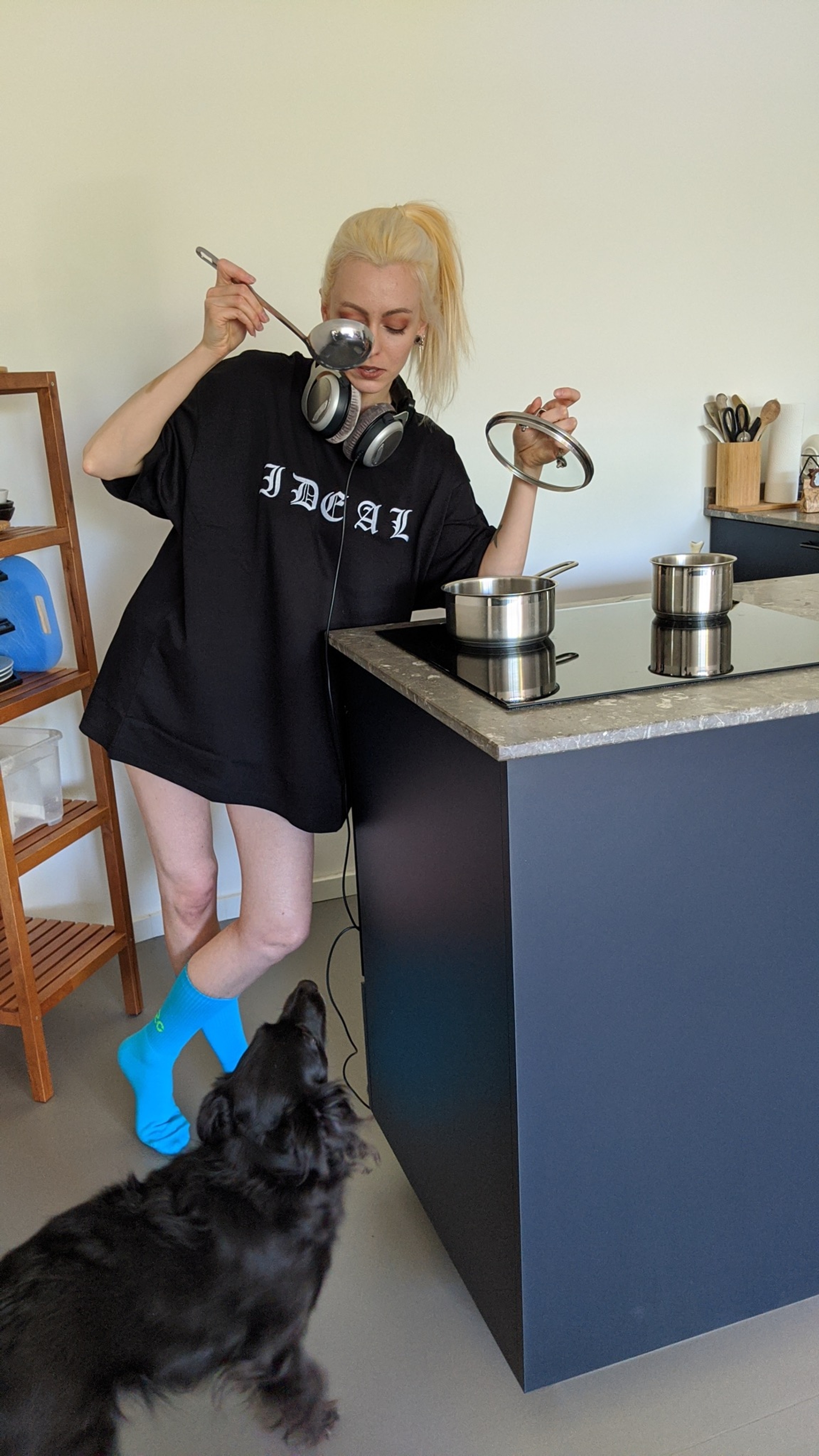 Greta wears the 032c LoveSexDreams "Ideal" t-shirt in black and "My Life My Rules" socks in blue. Tina is jealous.