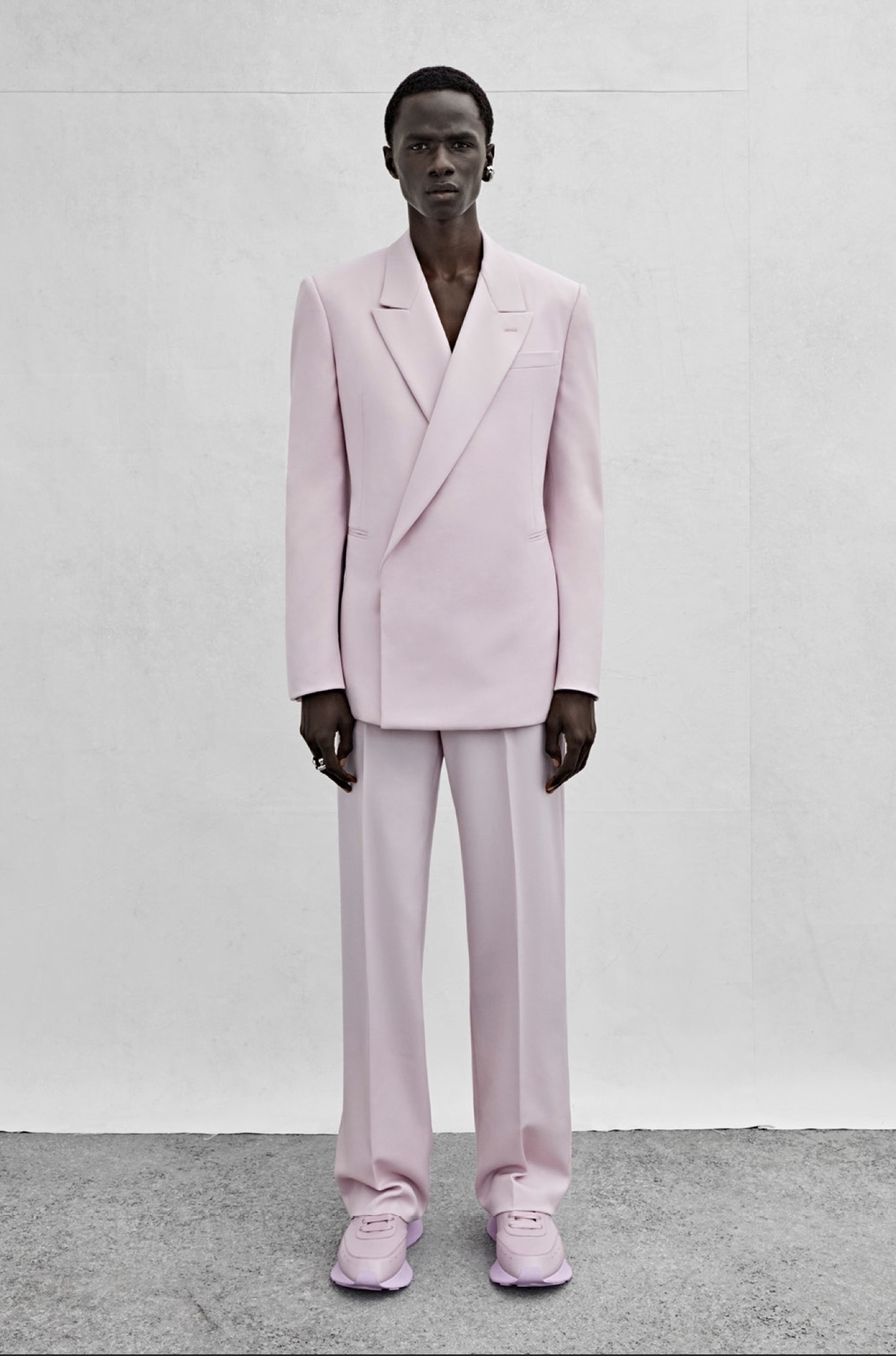 A double-breasted tailored jacket and wide-legged trousers in pale lilac grain de poudre.