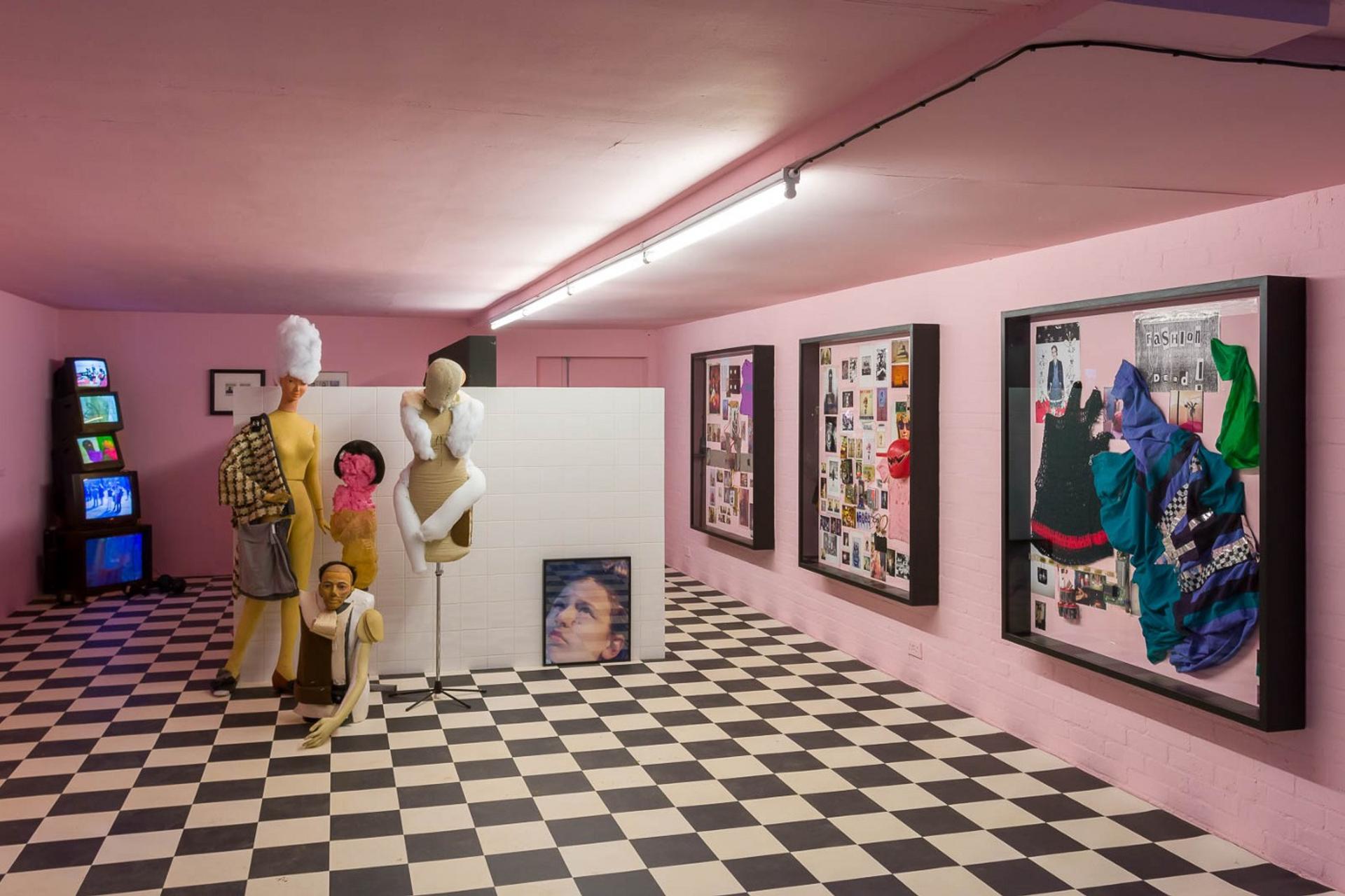 Honey-Suckle Company installation view, highlighting the ICA's divine floor tiles and pink walls.