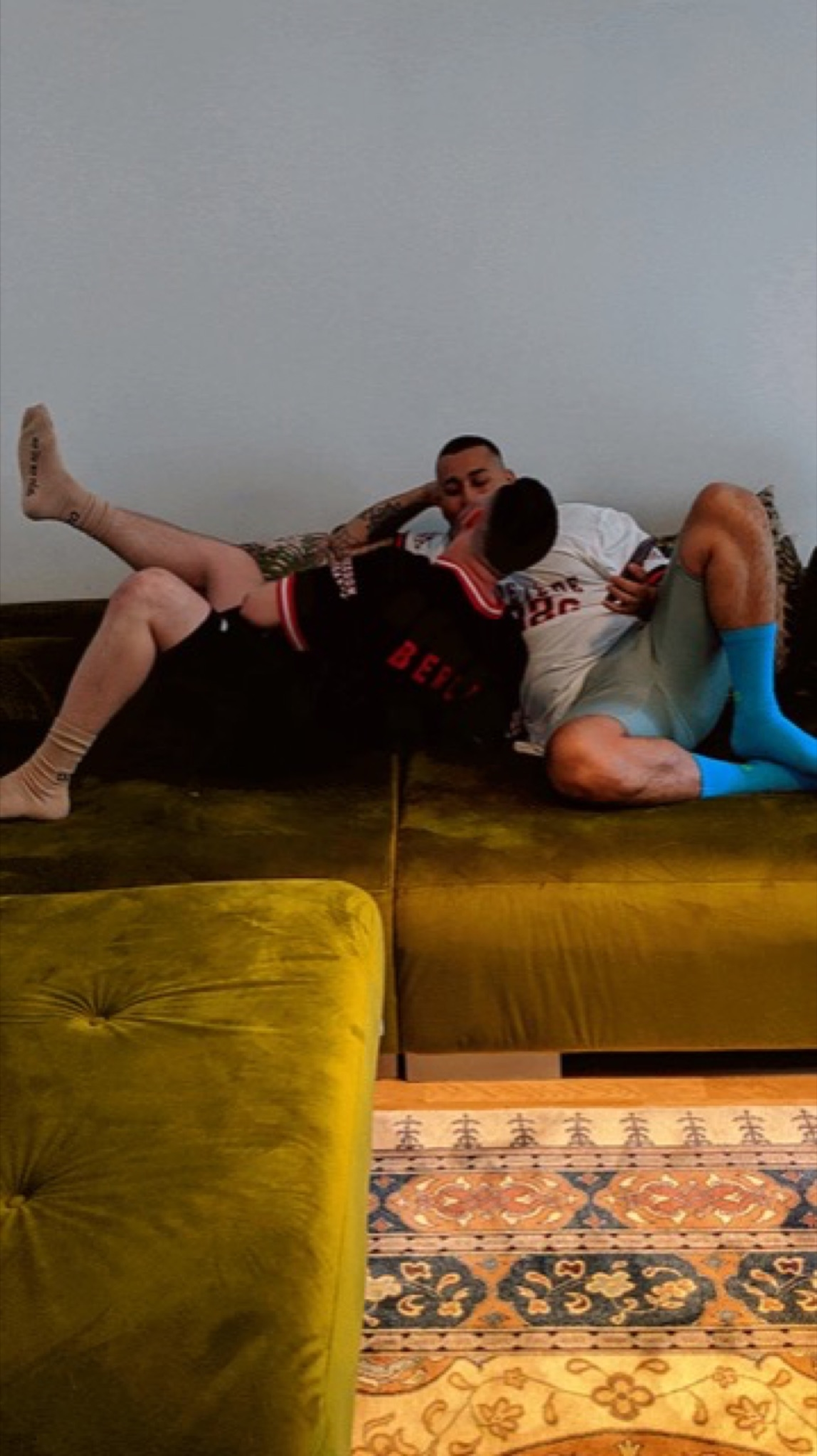 Parzival and Osman wear matching 032c LoveSexDreams "Team Société" Football Jerseys in white and black, Neoprene shorts in mint green and black, and "My Life My Rules" socks in blue and beige.