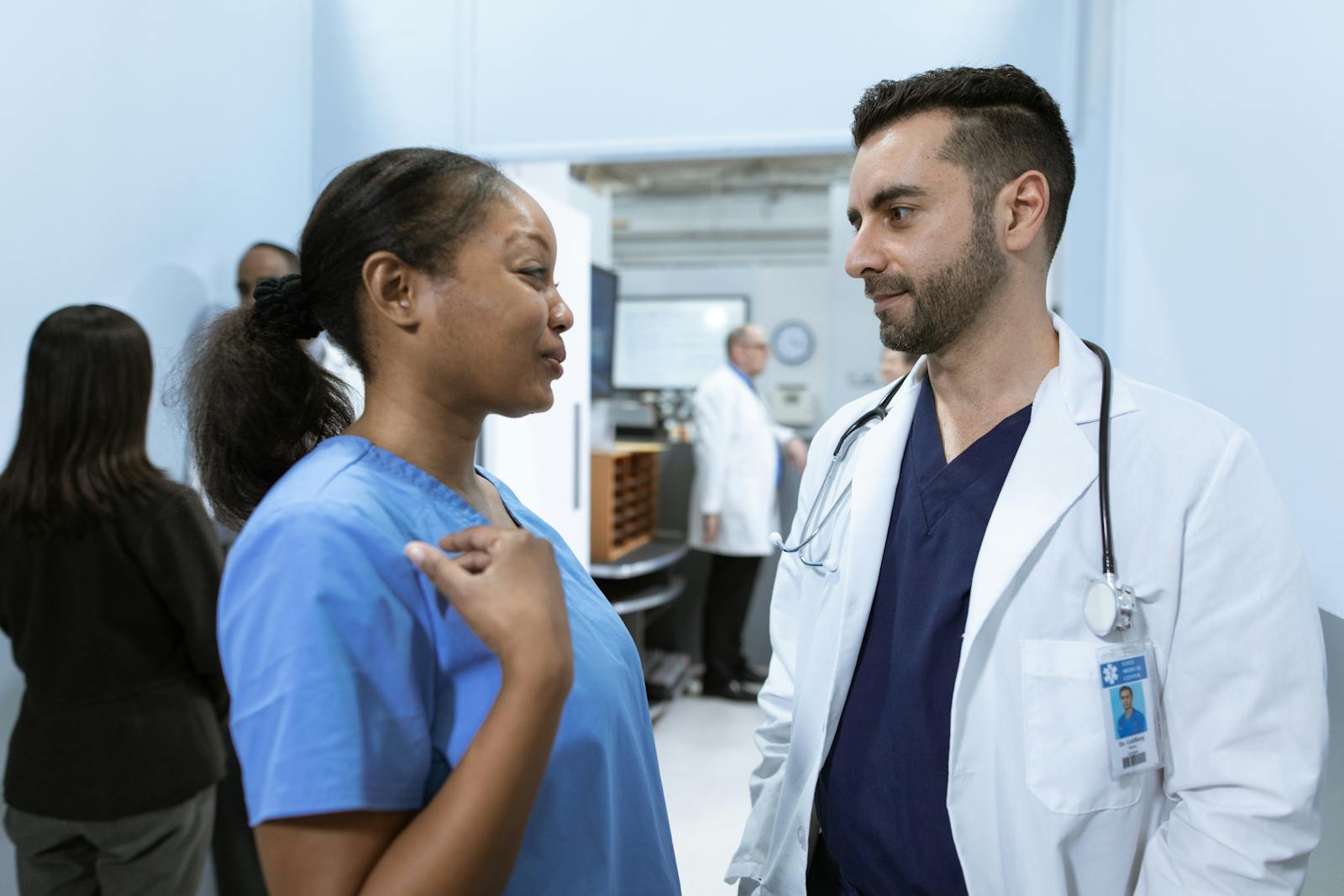 Healthcare professionals discussing a case together