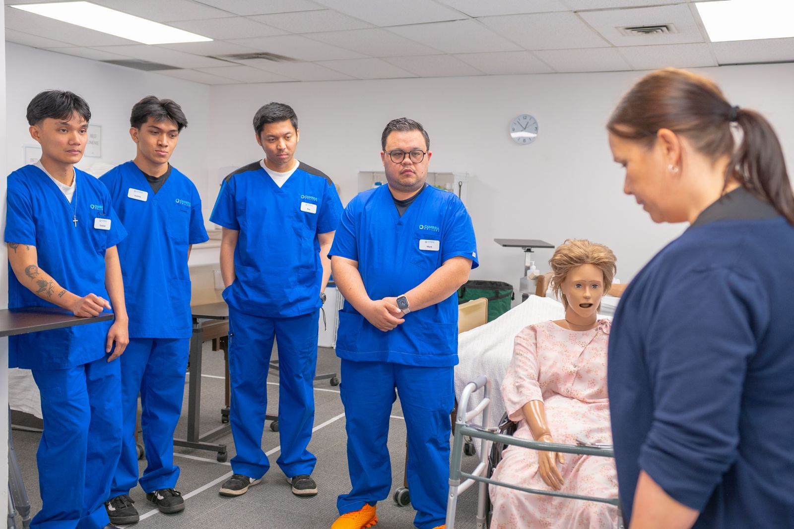 A nursing student practising a patient conversation on a laptop
