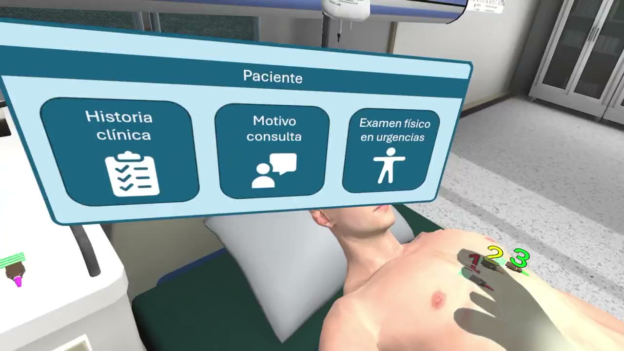 A hand placing the numbered electrodes on the patient’s chest in the EKG simulator